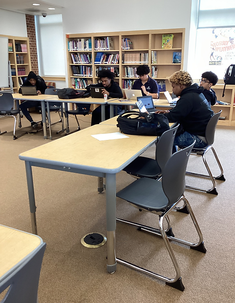 ACCE Library, students reading books