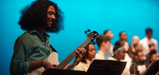 BSA Student playing the Bass on a recital