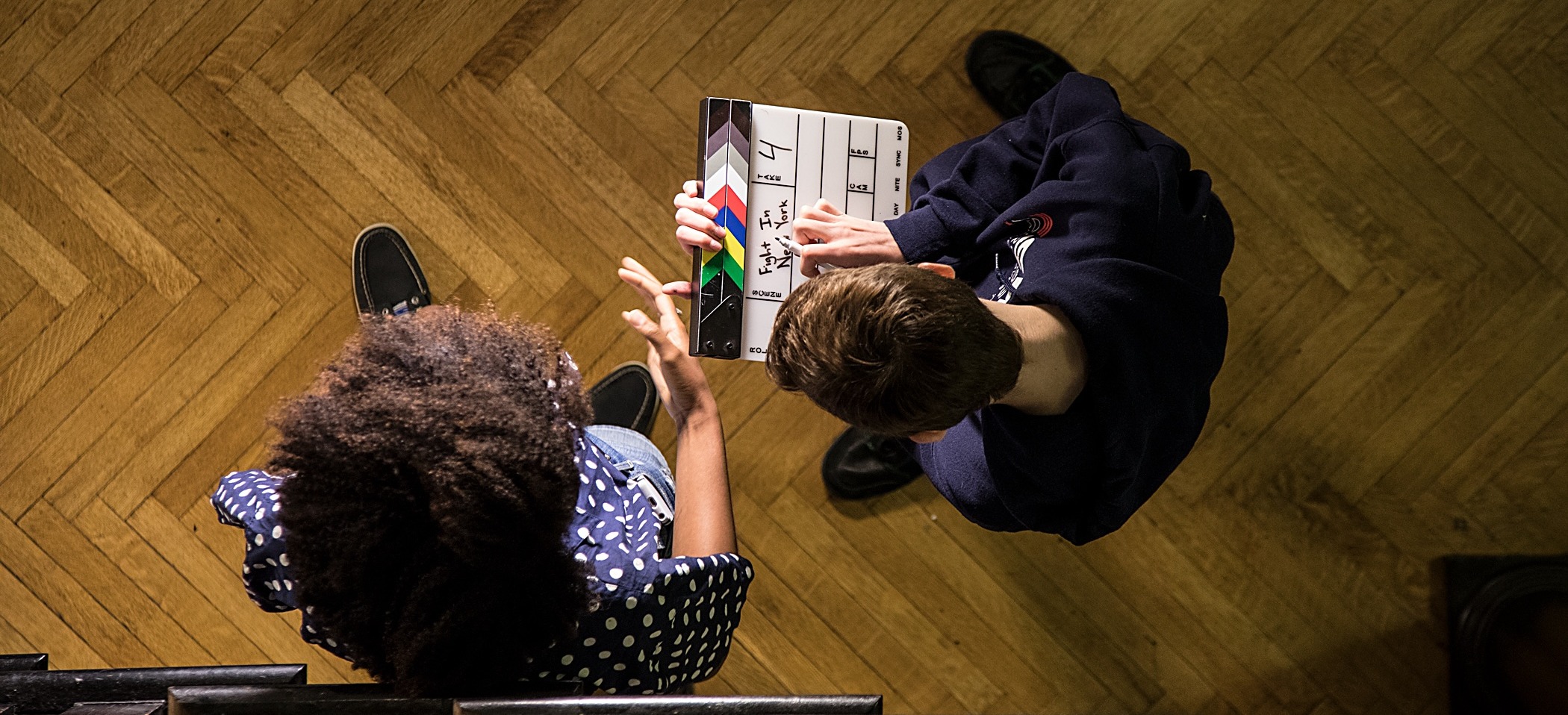 Two Students preparing to film