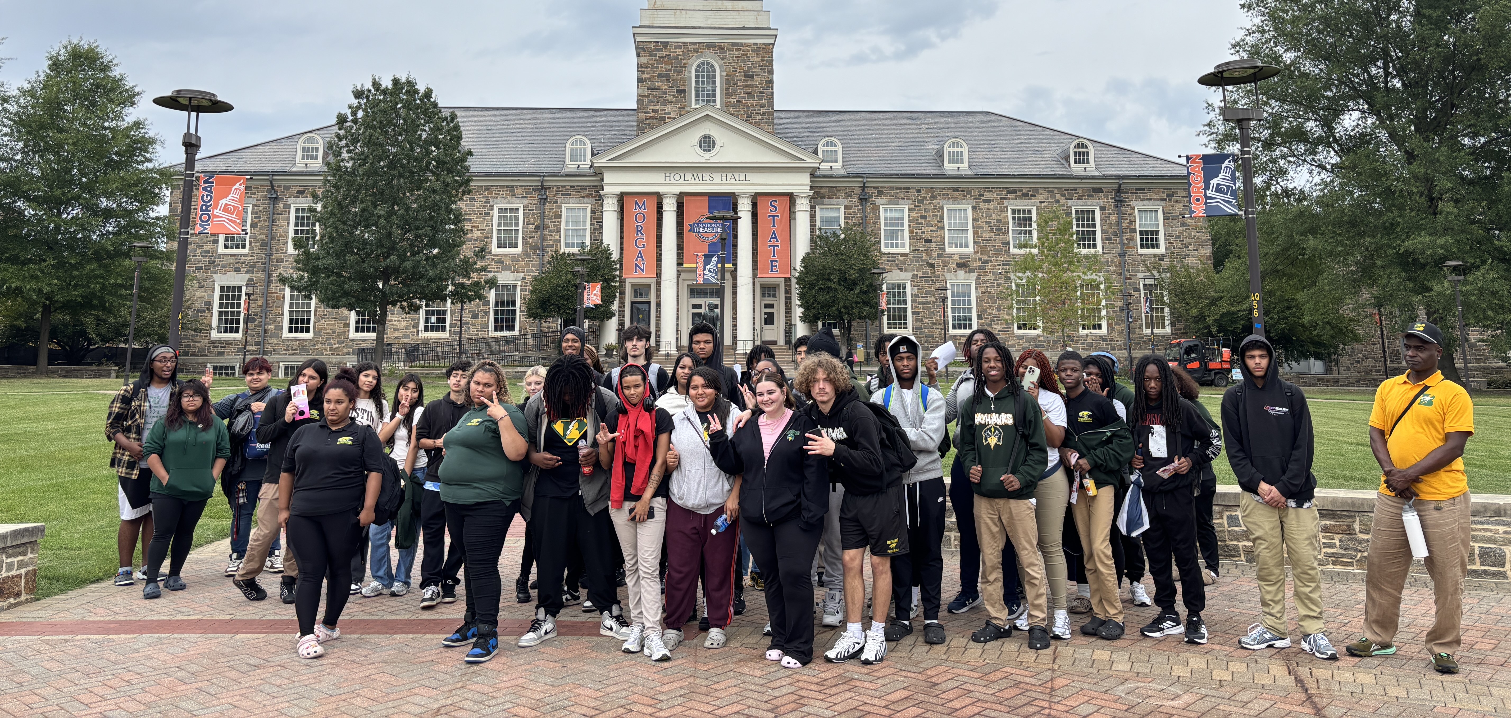 Students in groups for a picture