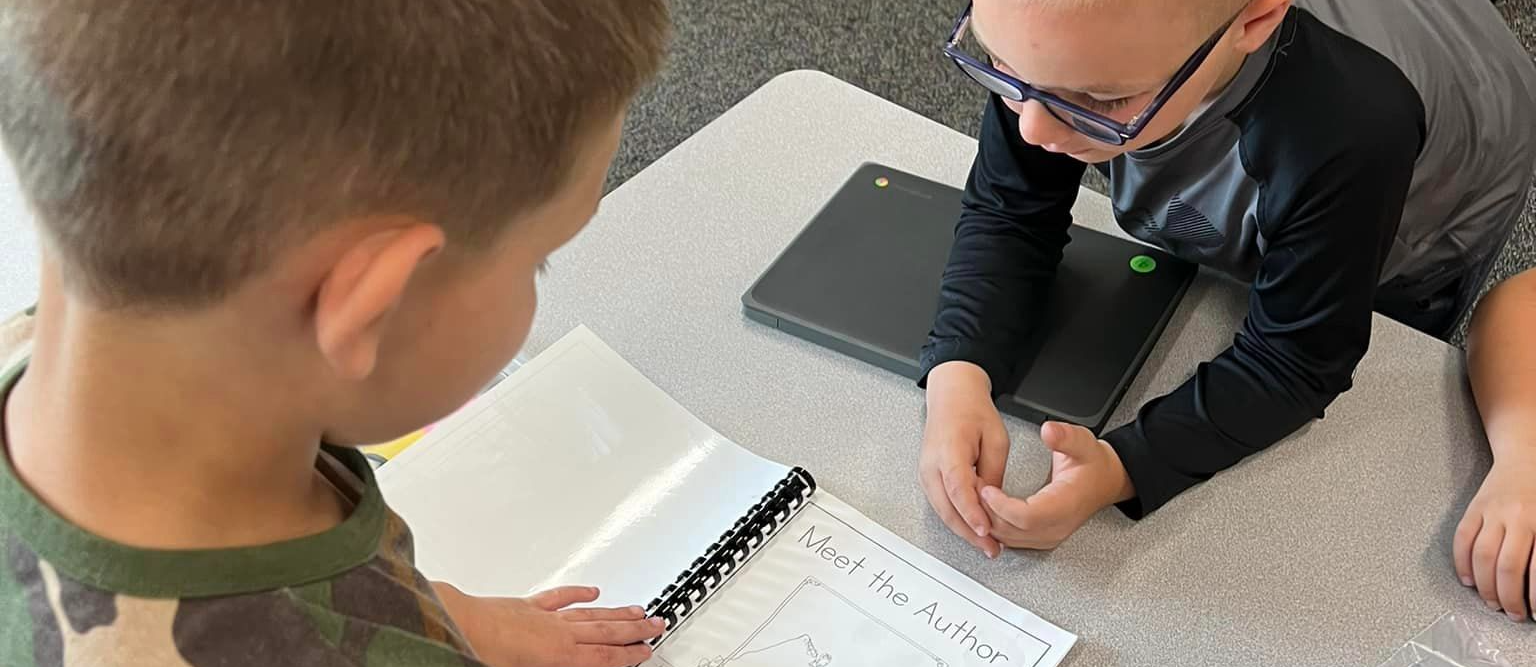 Students writing and sharing