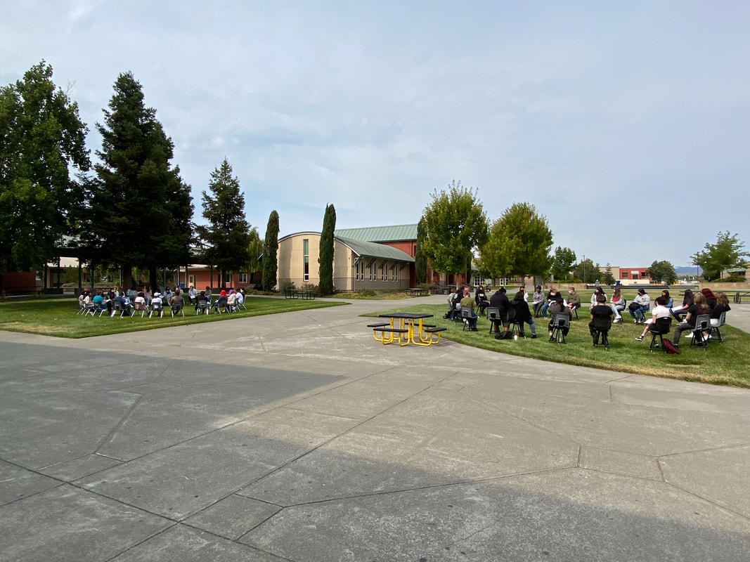 Parents and students participate in circle 