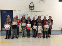 Students holding awards