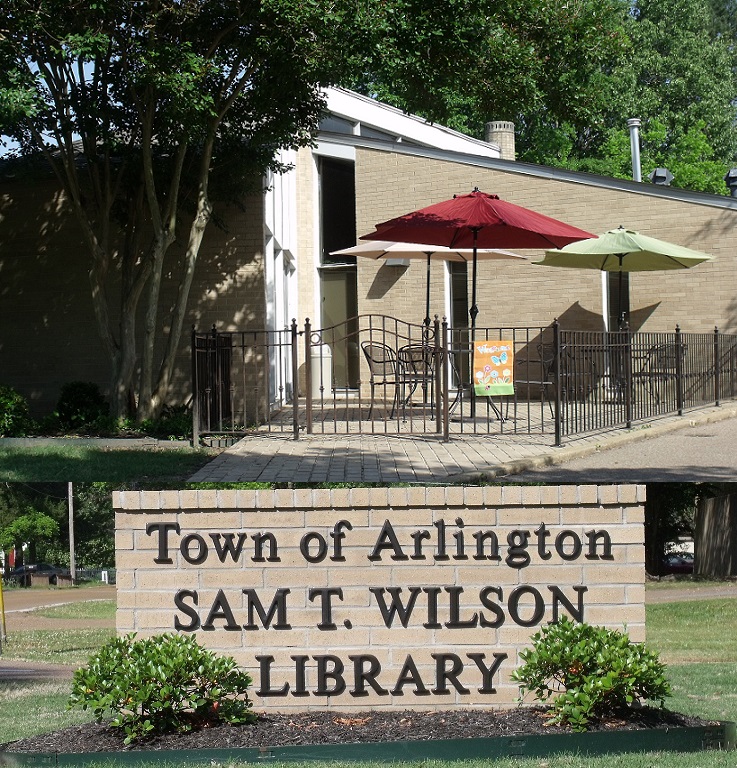 Arlington Library brick sign with Library in background