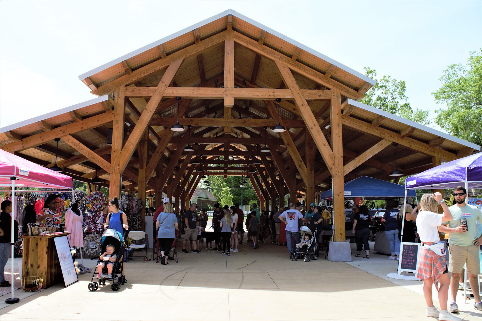 Picture of farmers market under wooden roofed pavilion