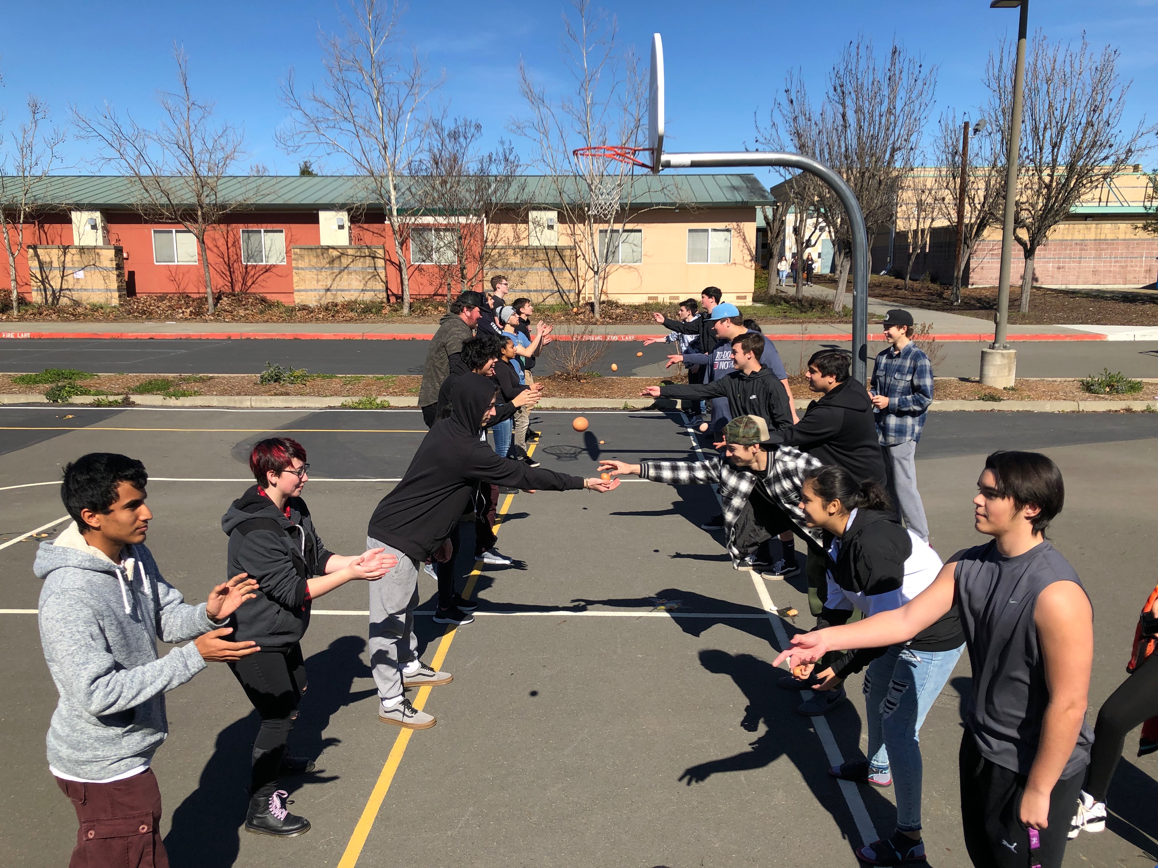 A photo of students playing outside.