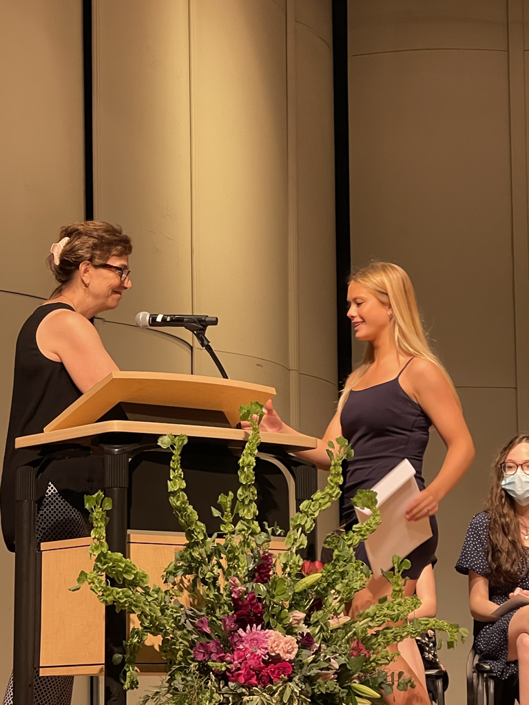 student accepts scholarship