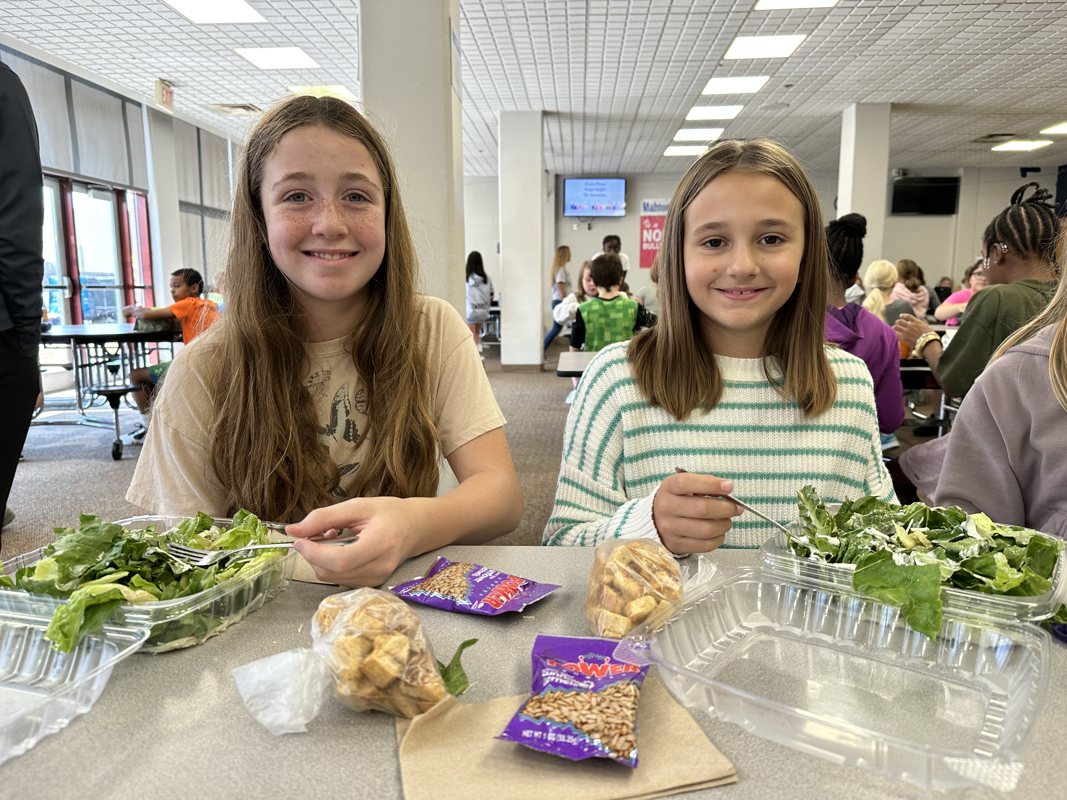 Mahtomedi Middle School students with fresh salads