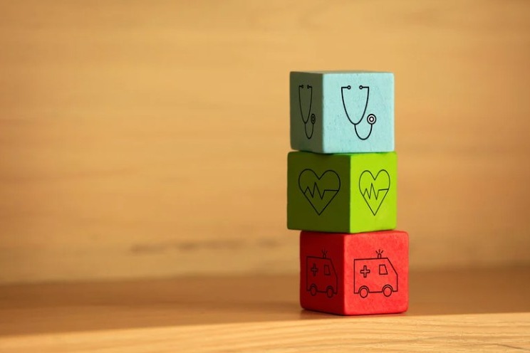 cubes with health related icons