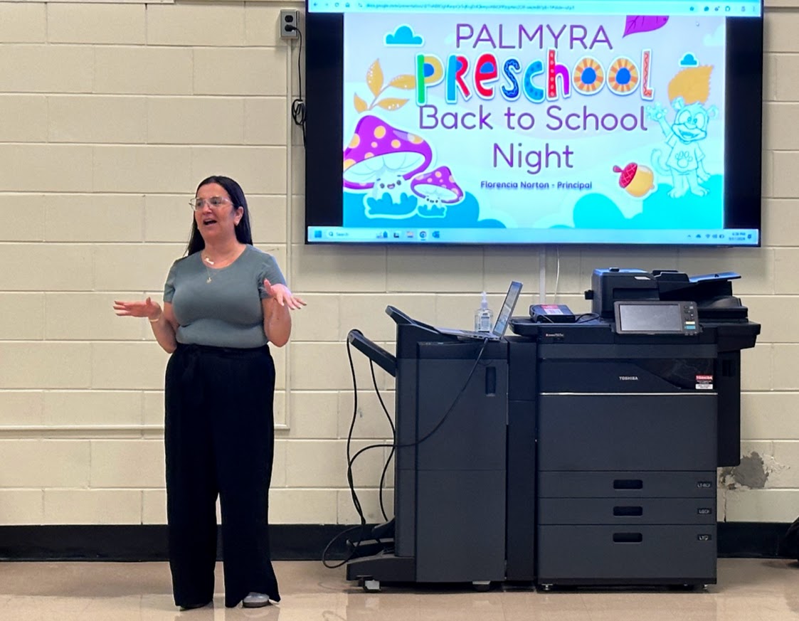 principal principal speaking to parents at back to school night