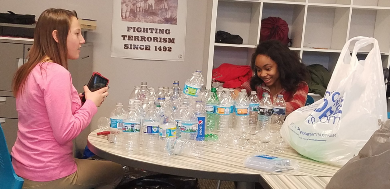girls with plastic bottles