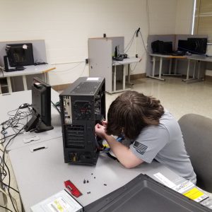 student in front a computer