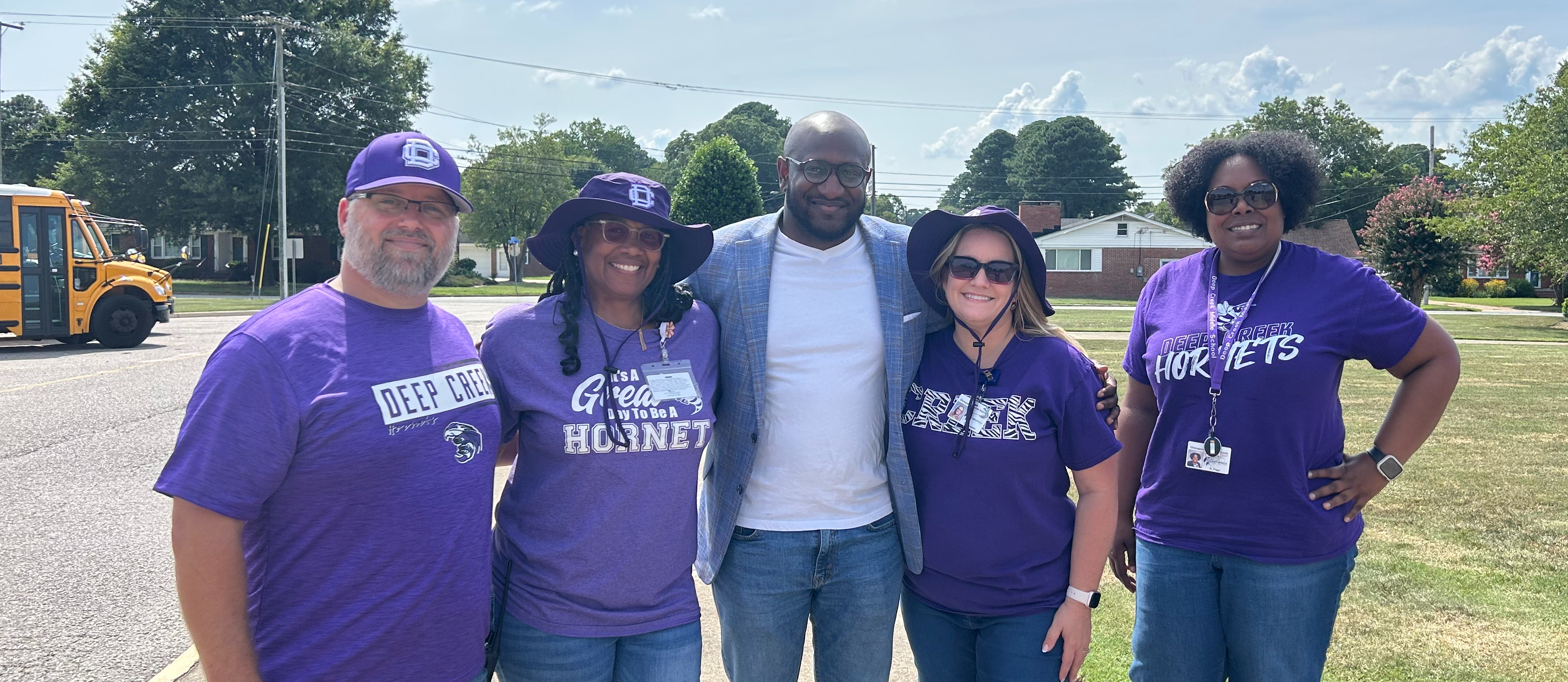 Here's who is in the photo: (Pictured left to right: Mr. Thomas Smith (8th grade Asst. Principal), Mrs. LaTricia Davenport (Principal), Pastor Wise, Mrs. Tracy Reynolds (6th grade Asst. Principal), and Dr. Karitta Page (7th grade Asst. Principal). 