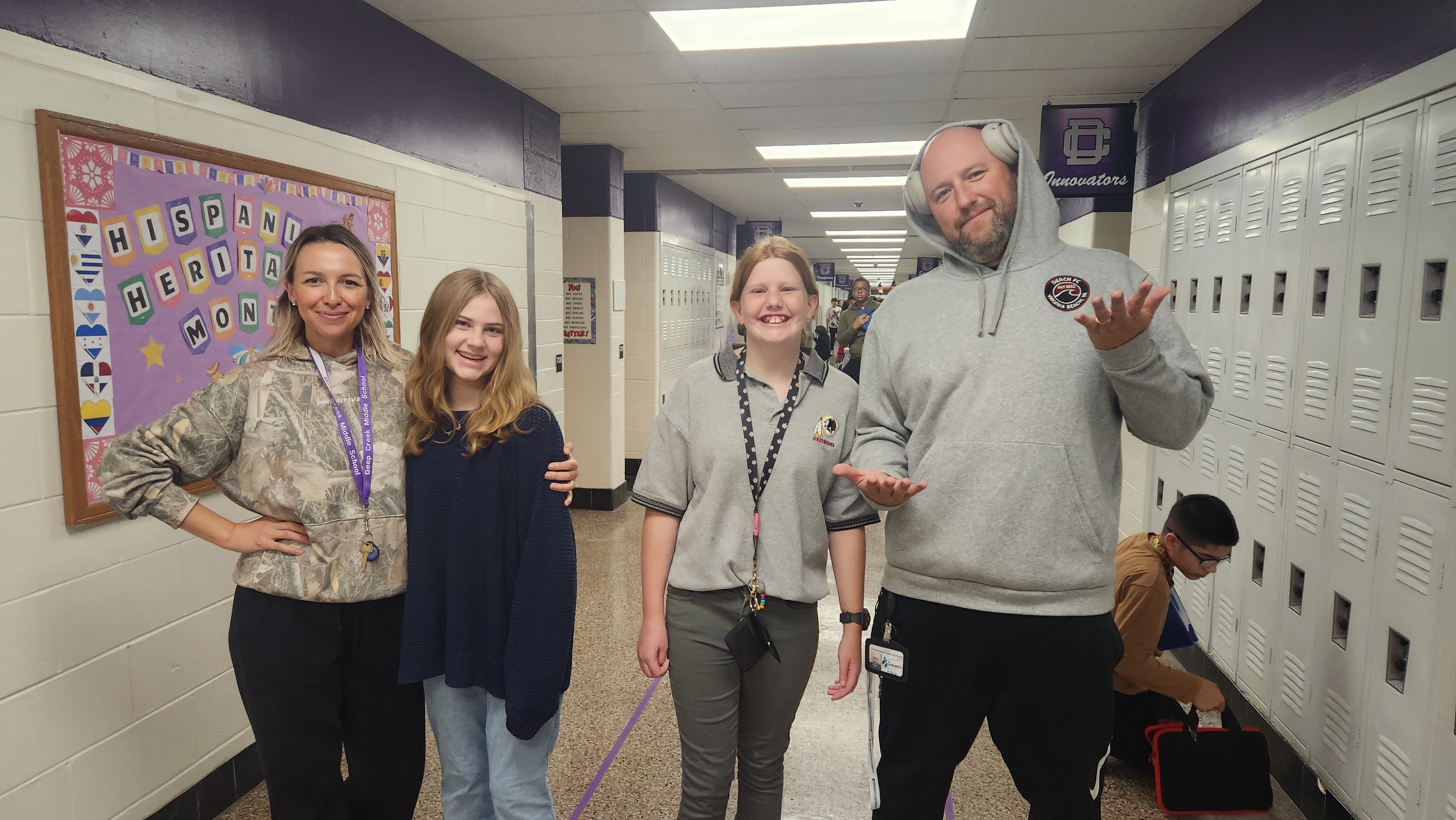 Two students dressed like teachers and two teacher dressed like students.