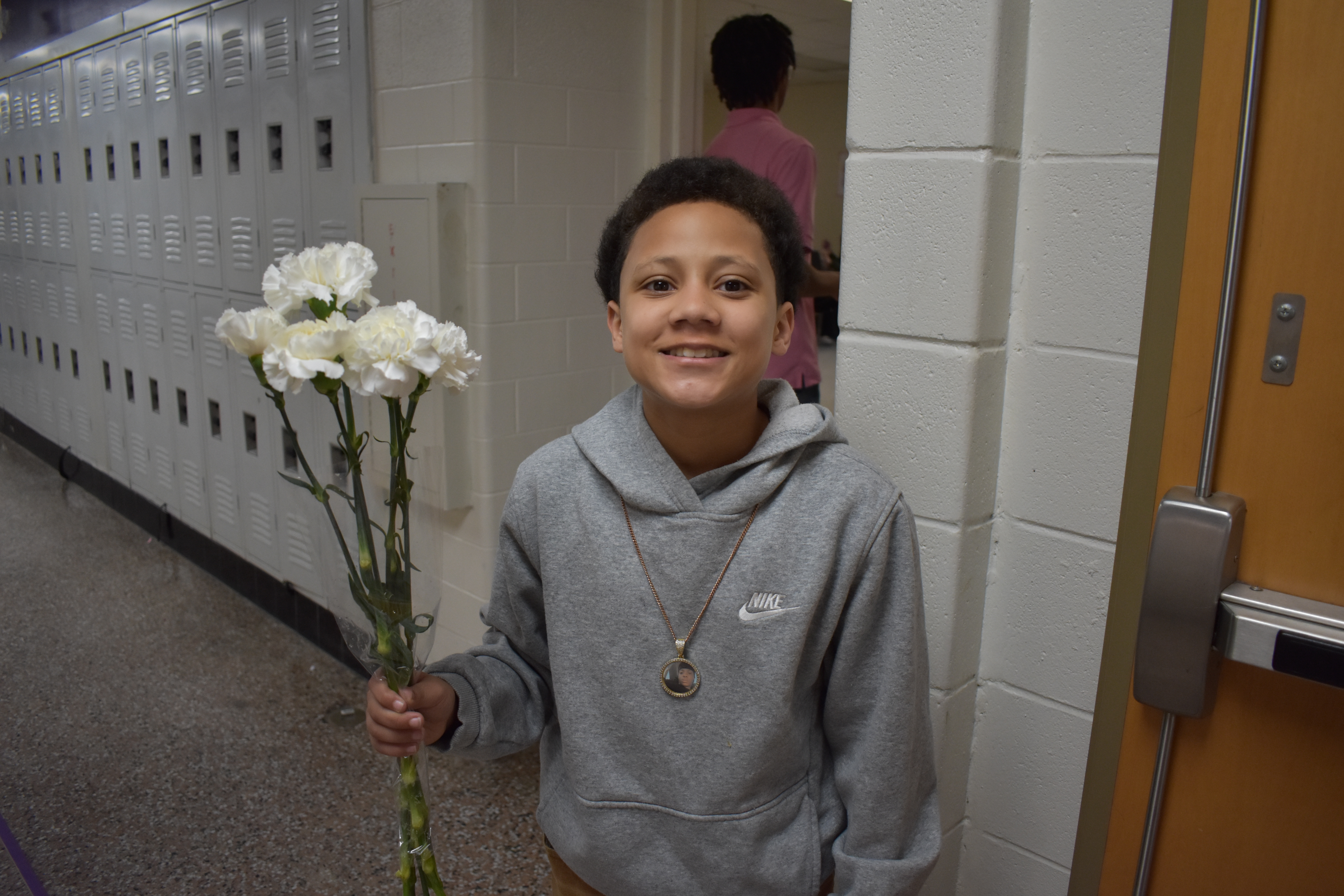 Student with flowers