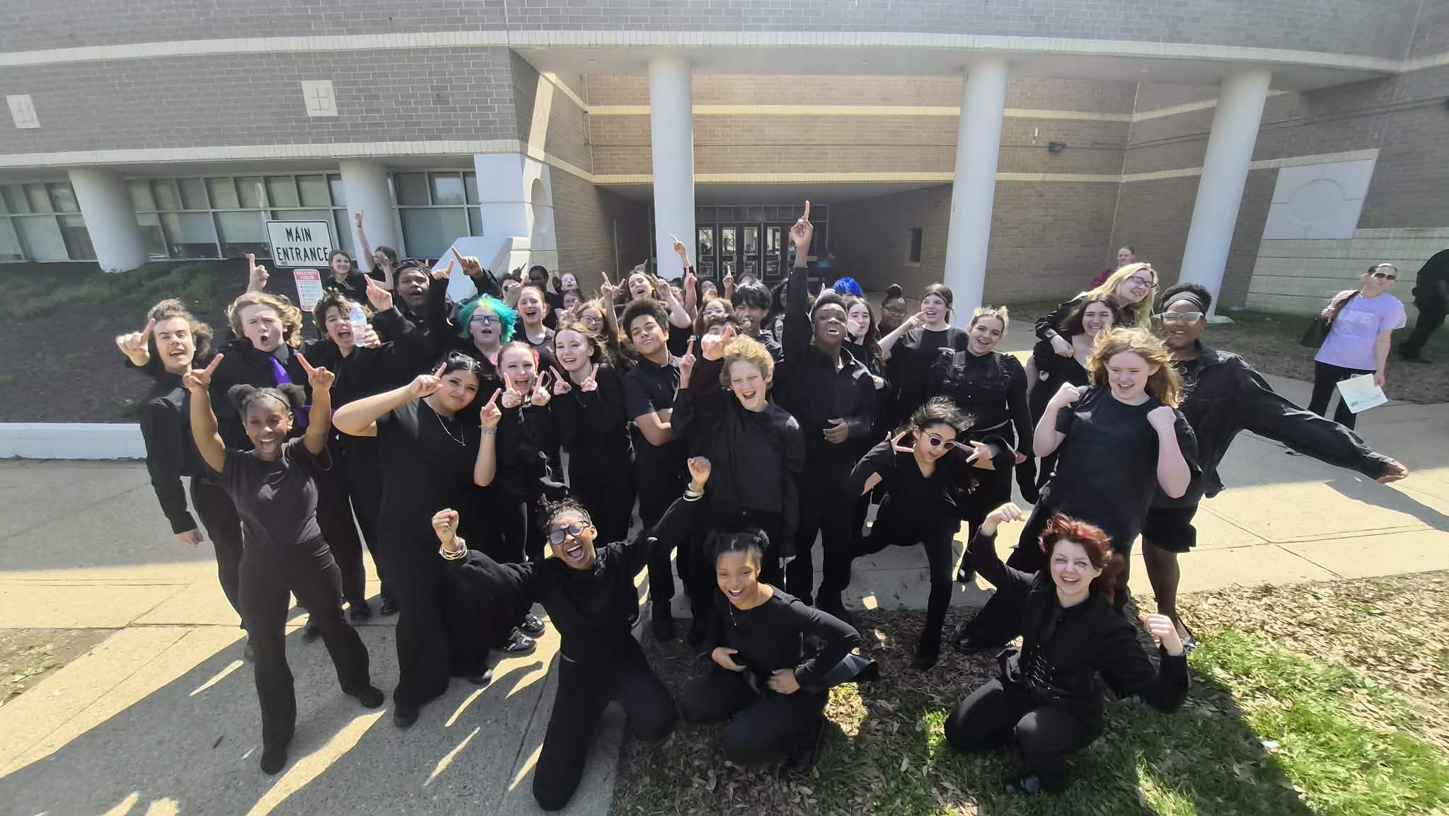 Our seventh and eighth grade chorus students celebrating their excellent rating.