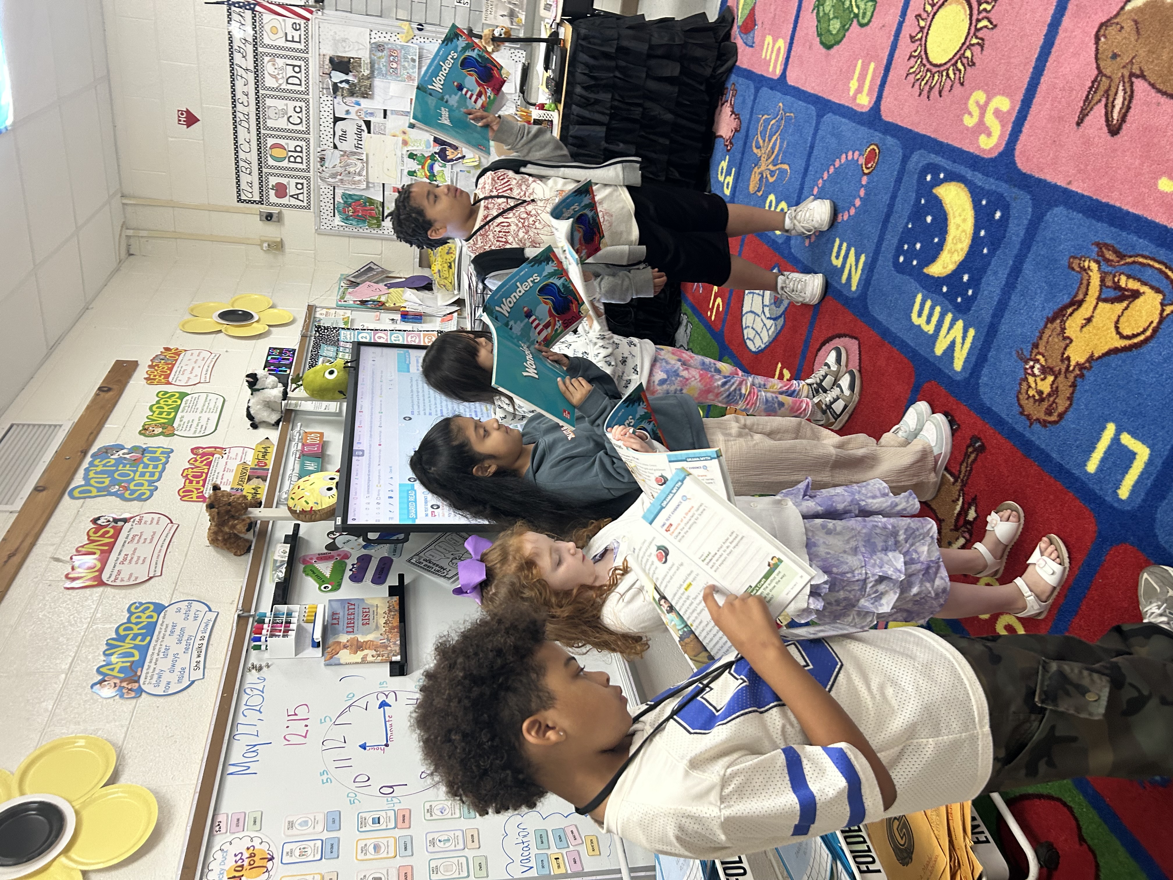 students learning about drama by performing a play