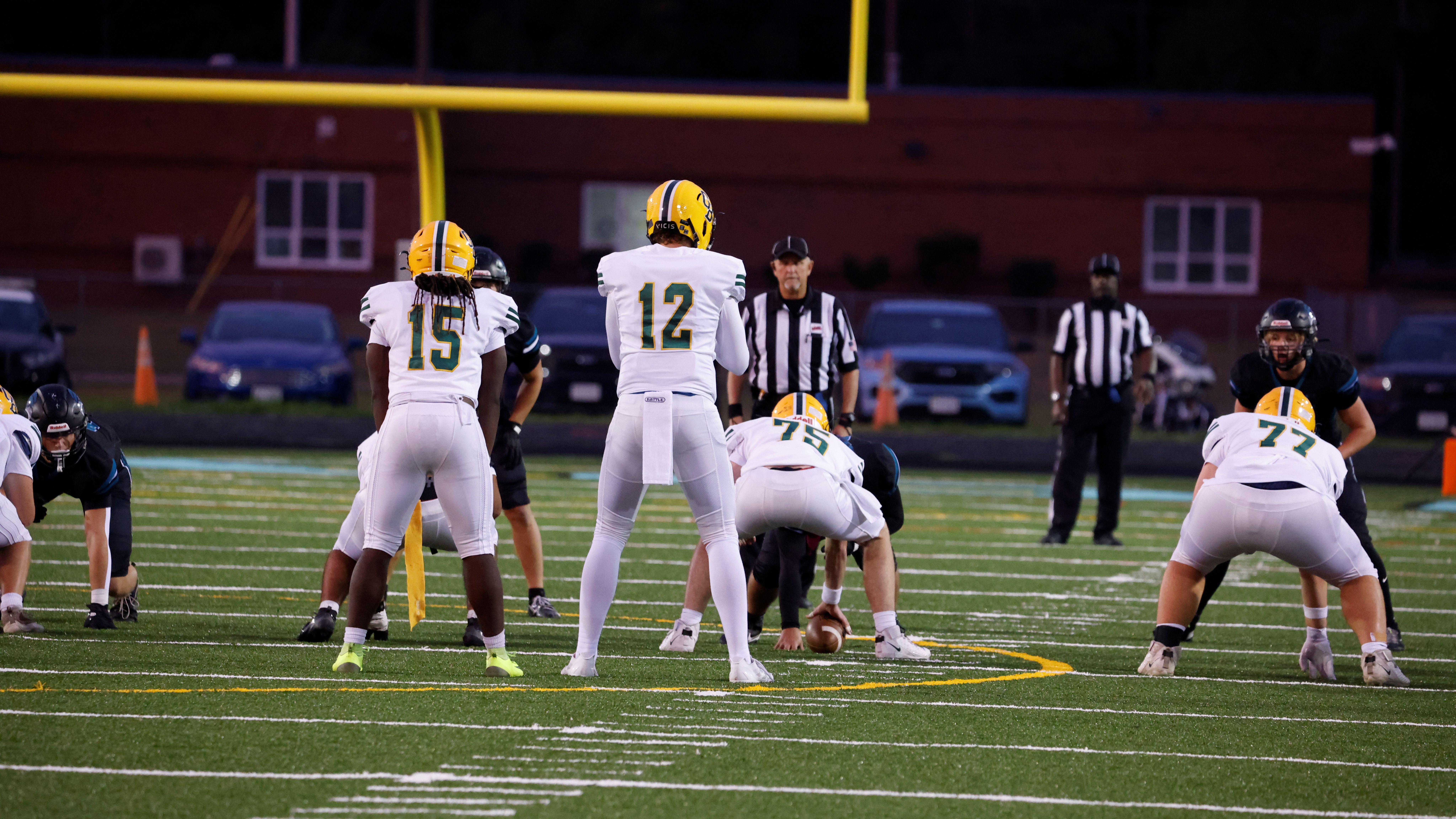 The Great Bridge football teams offense prepares for a play agsint Hickory High