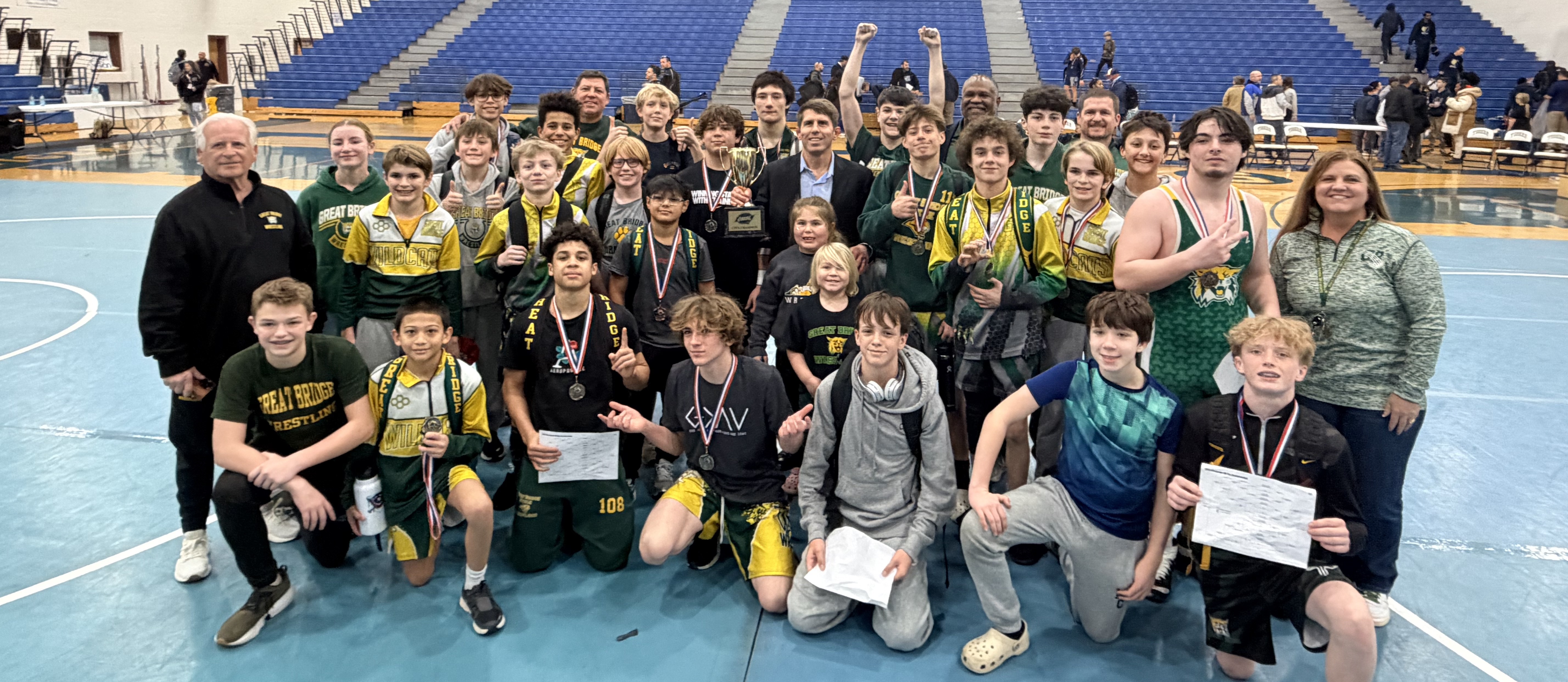 The GBMS Wrestling team celebrates its CMSL City championship