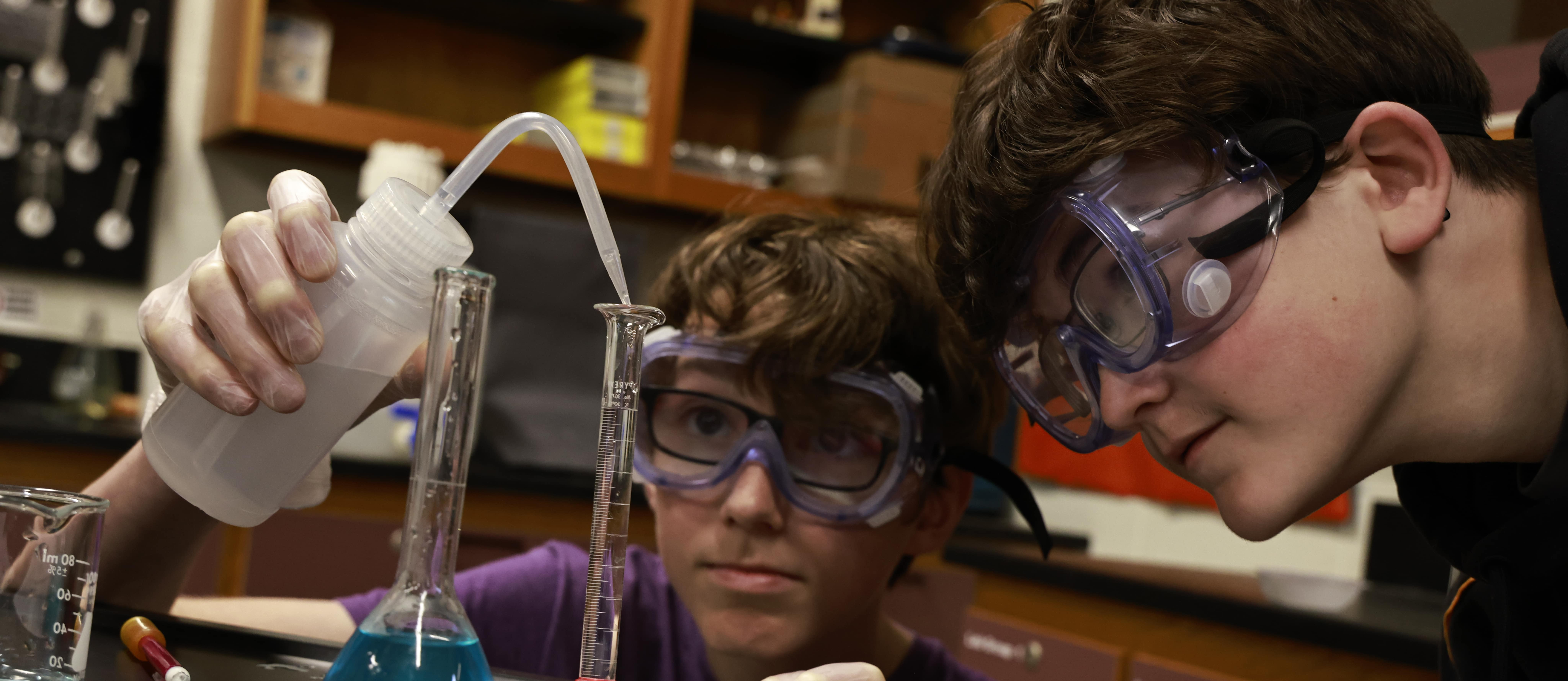 A Hickory High Student participates in a chemistry experiment