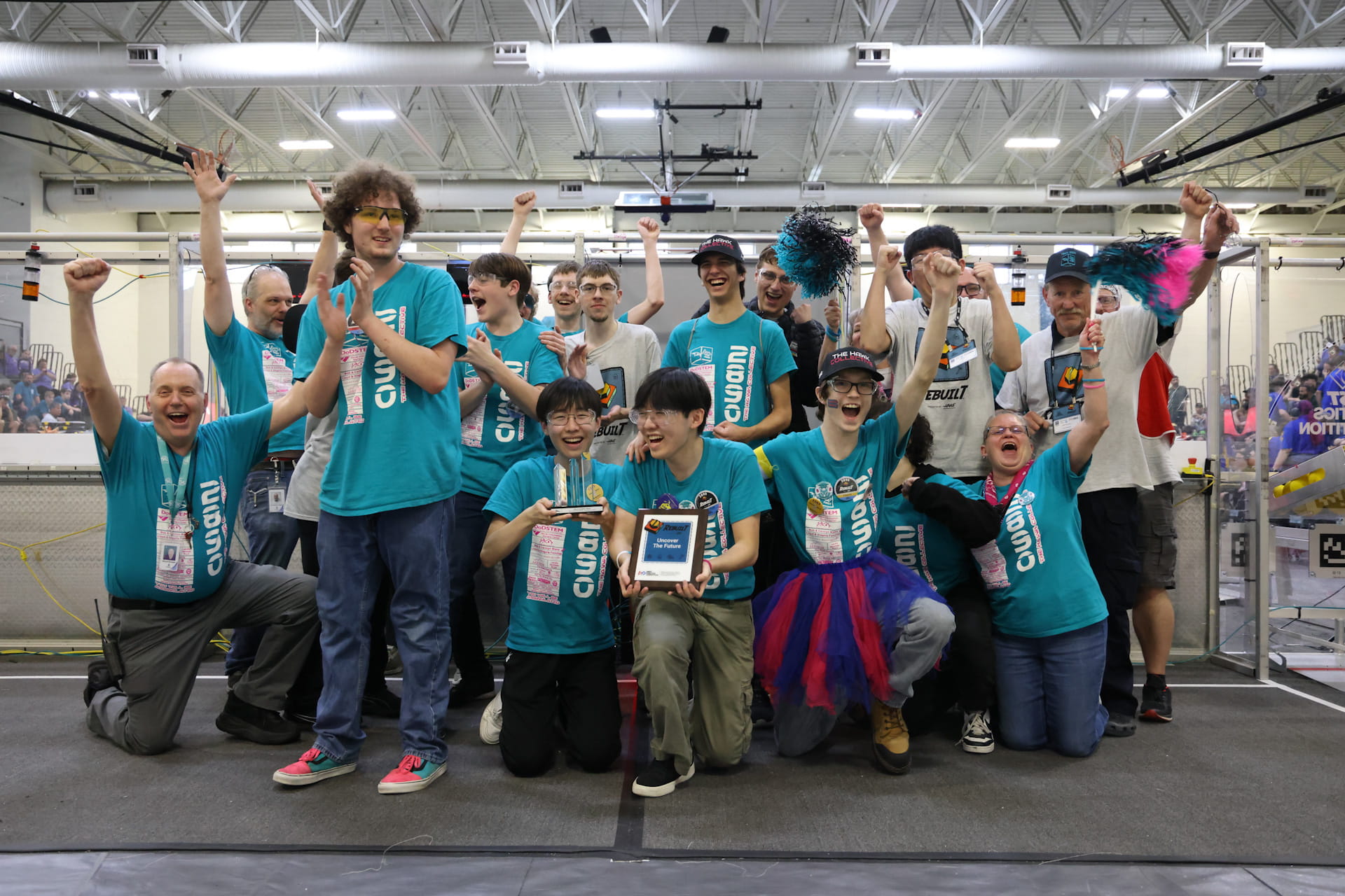 The HHS robotics team celebrate after their competition 