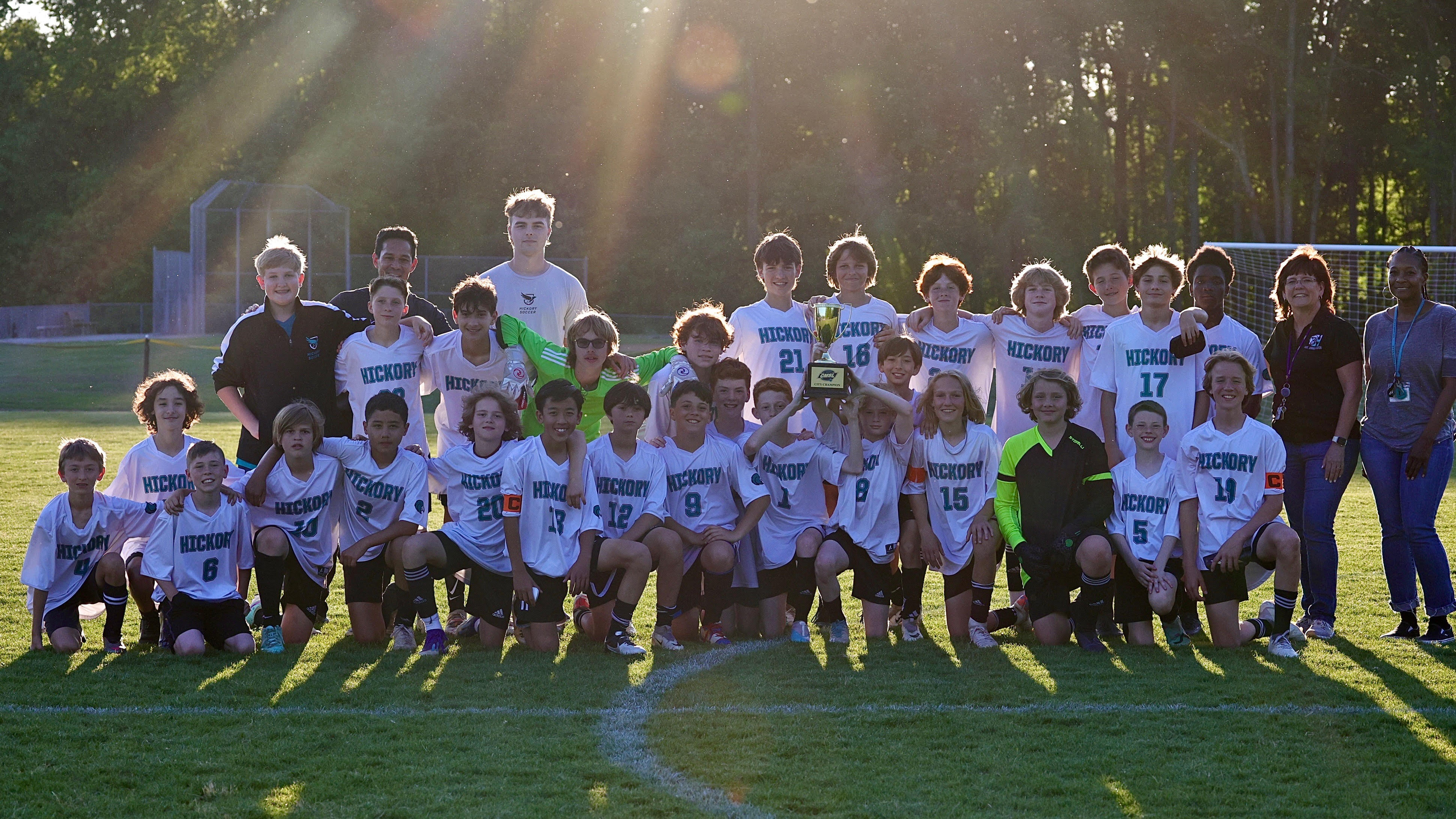 2024 CMSL Boys Soccer Champs - Hickory Middle poses with trophy
