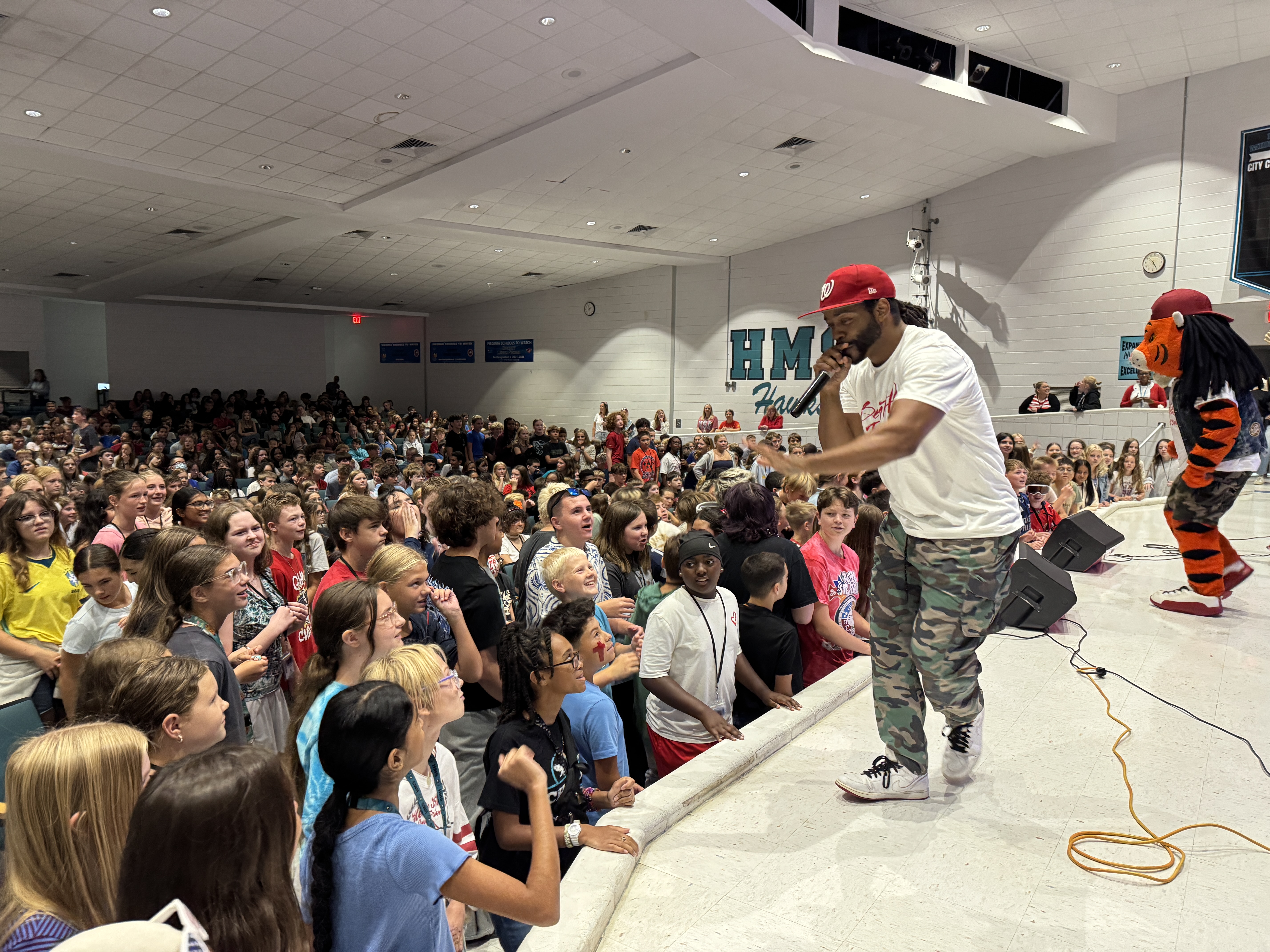 guest speaker in our auditorium hyping up our students