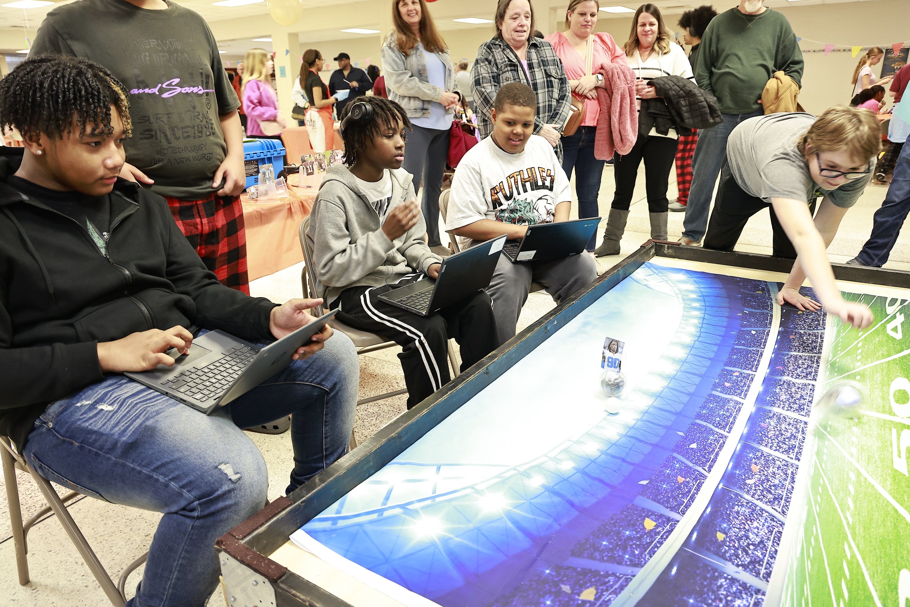 students coding on computers