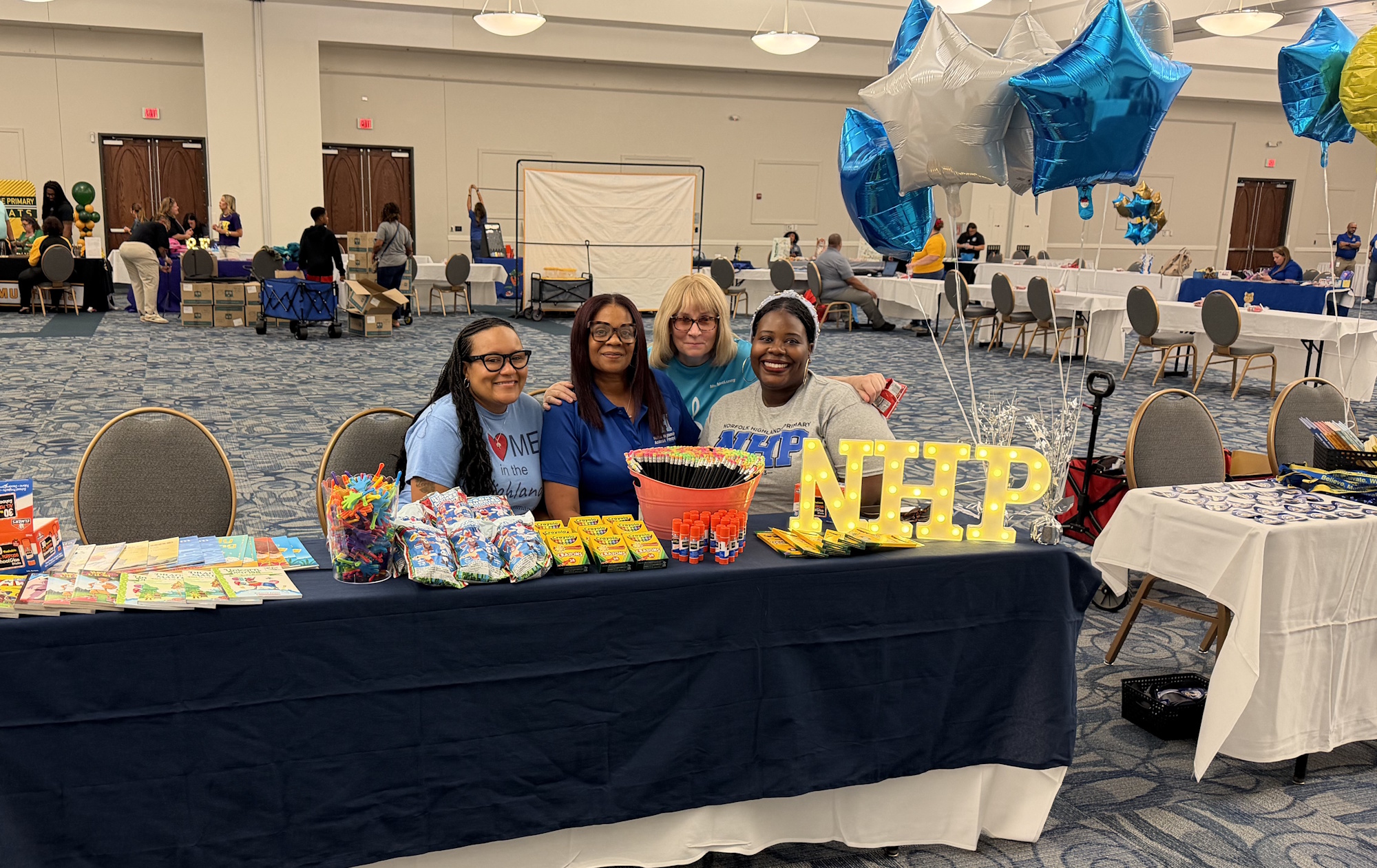 NHP Staff pose for a photo at the Get on the Bus Event