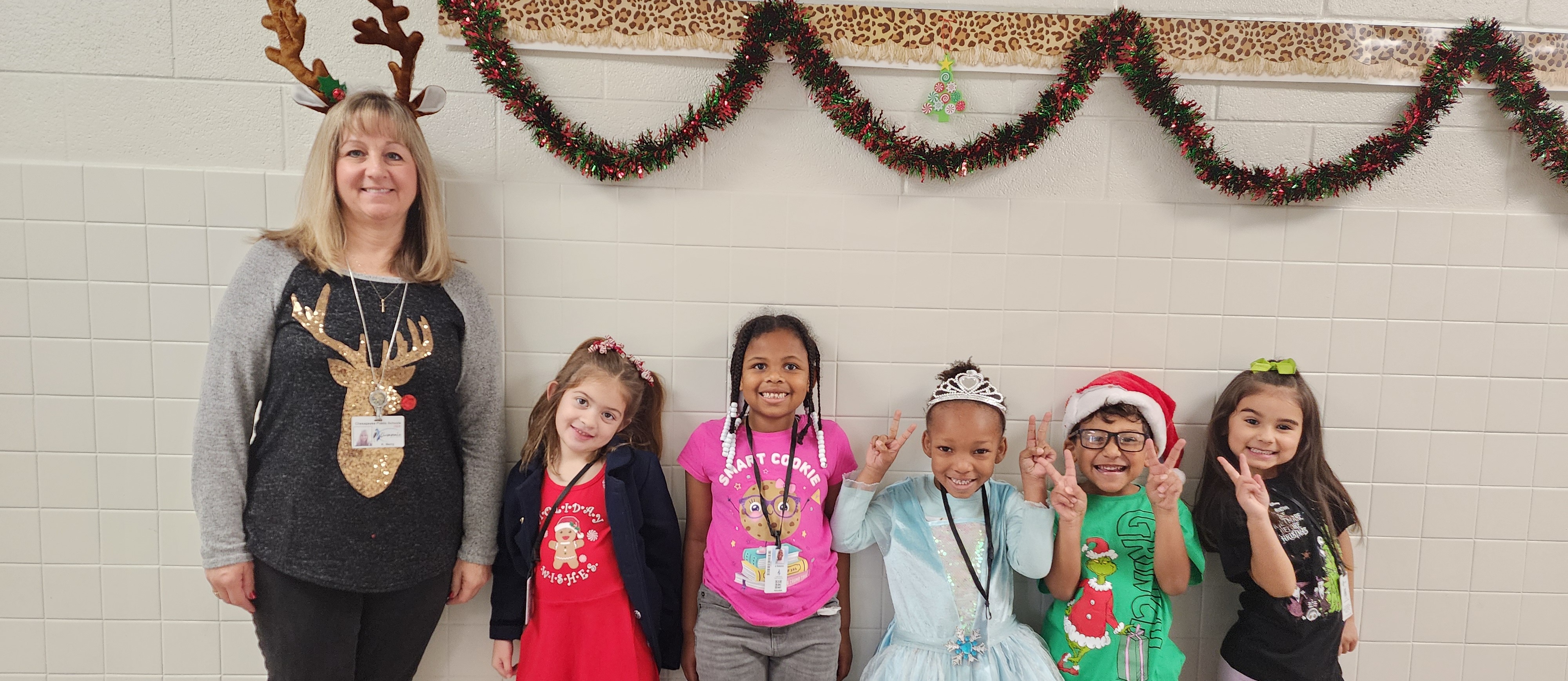 Mrs. Berry and students dressed as favorite Holiday Characters