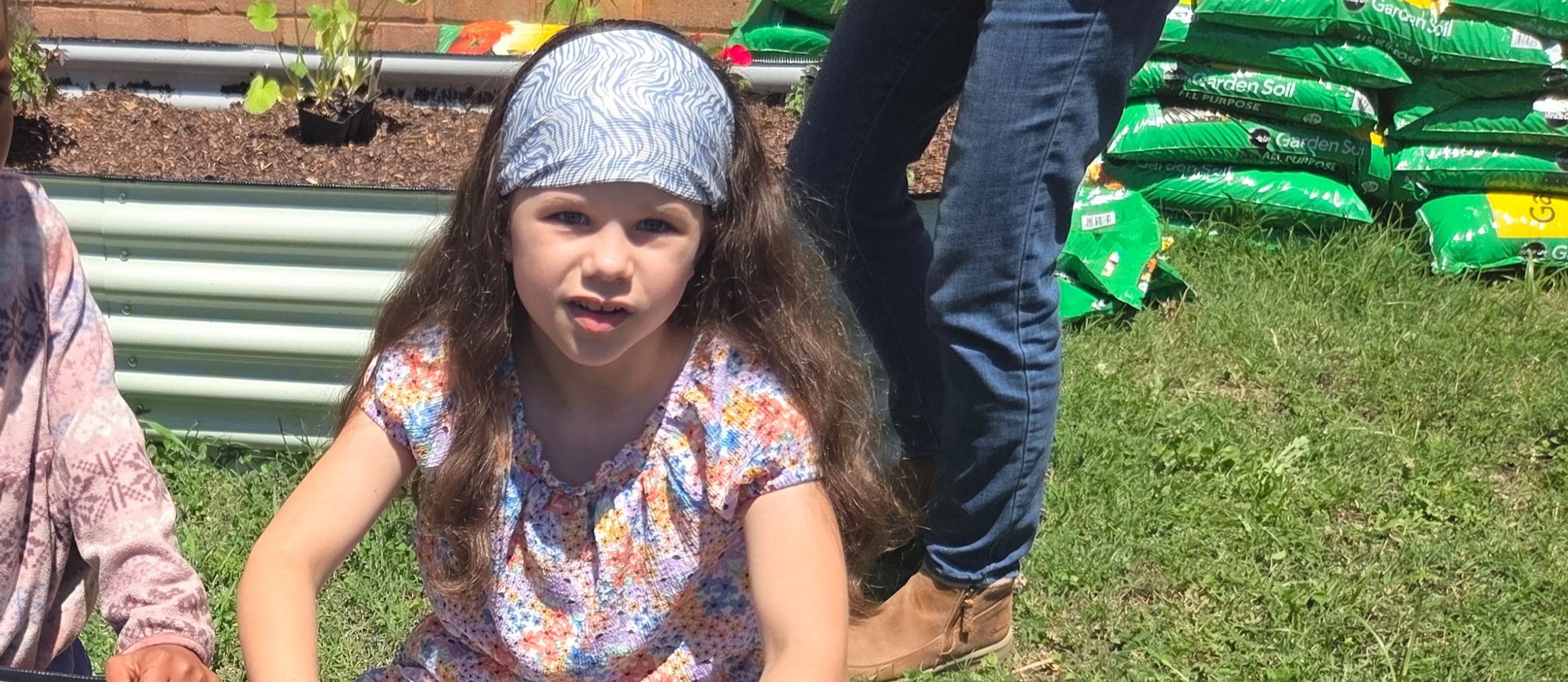 Student planting Flowers