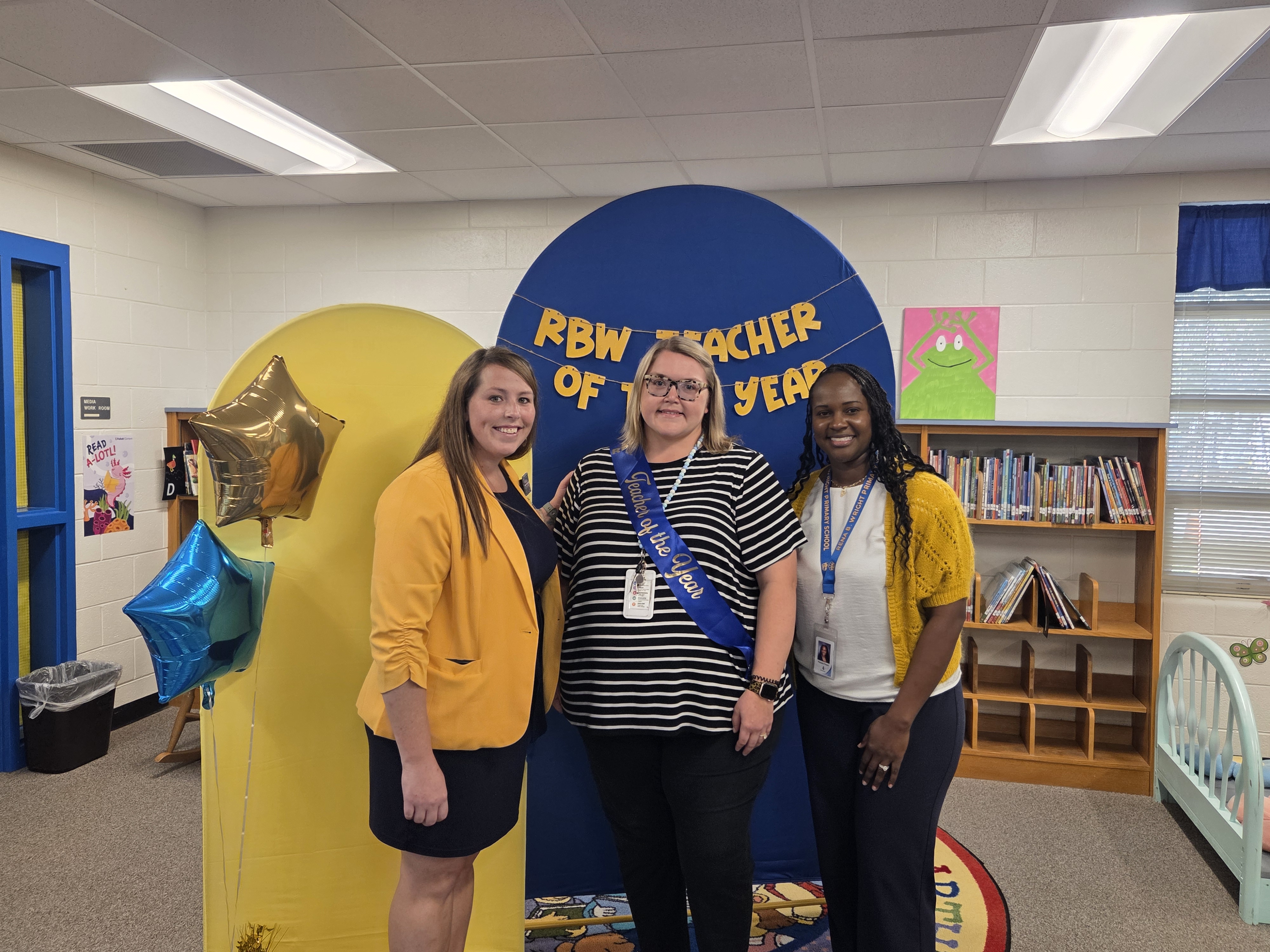 Ms. Szymborski, Ms. Congleton (TOY), Mrs. Foard at teacher of the year celebration.