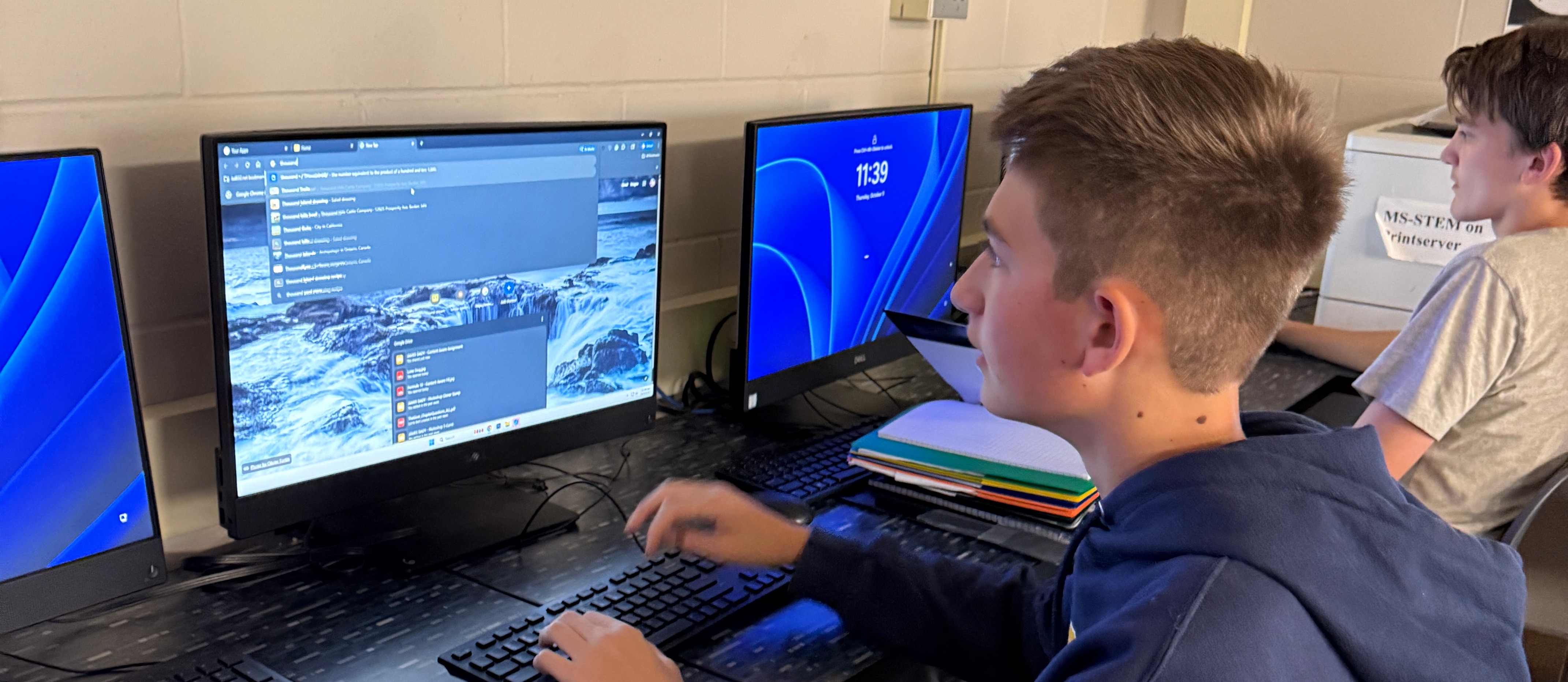 Students coding on computers