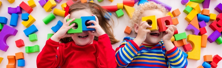 Kids Holding Blocks over their Eyes