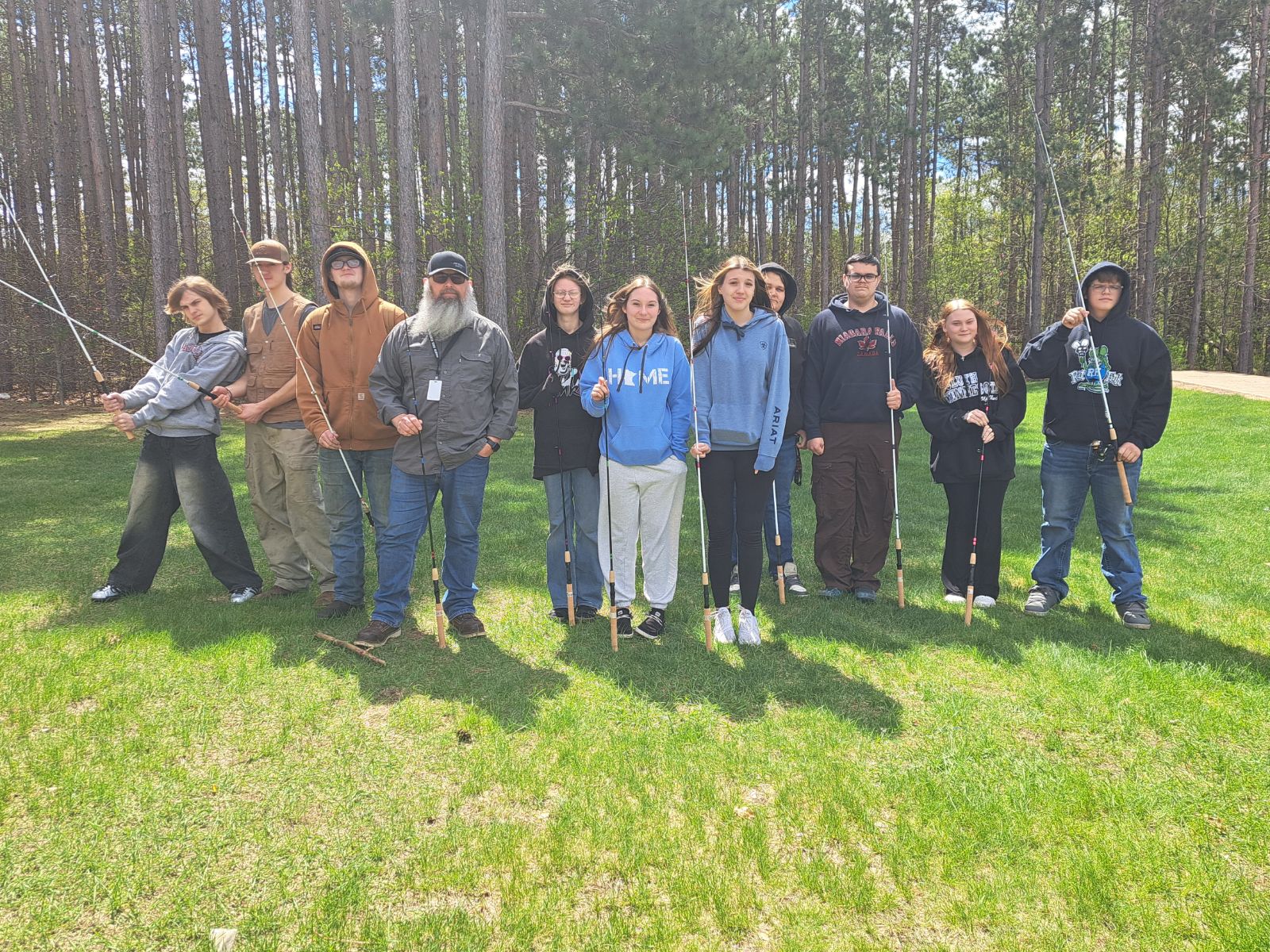 Students with fishing poles