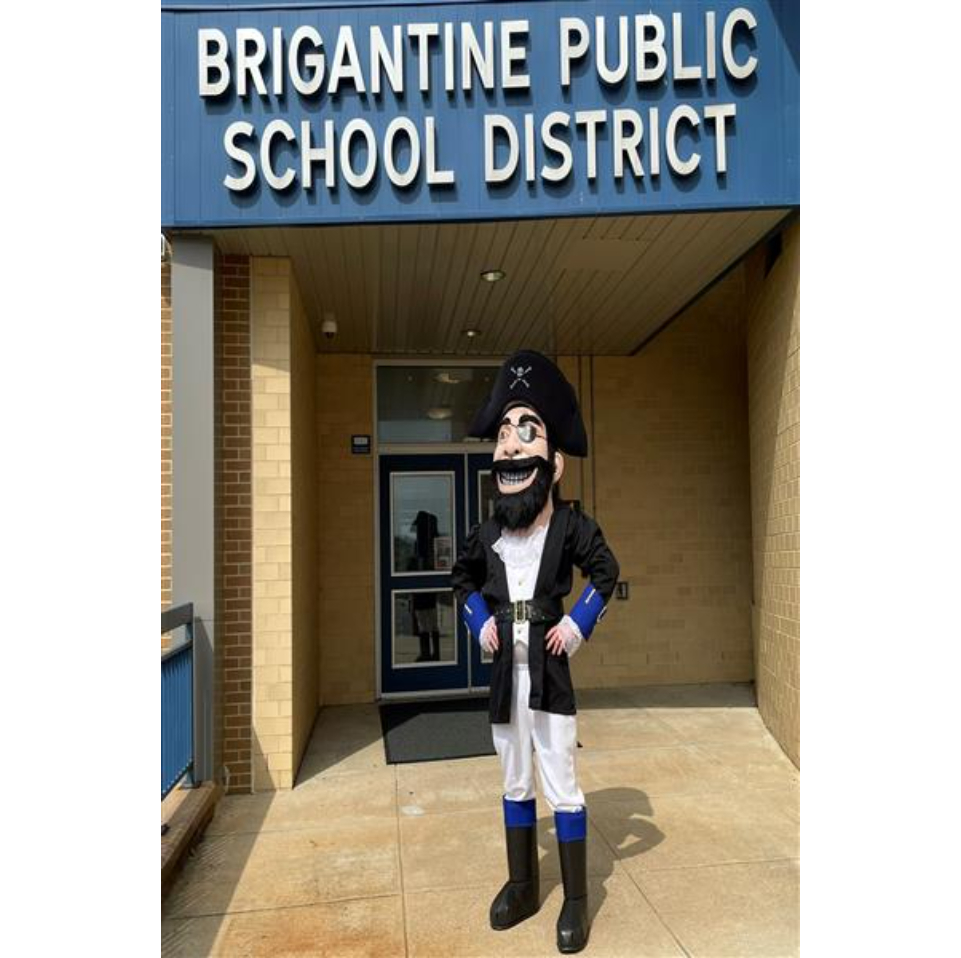 Mascot in front of the school