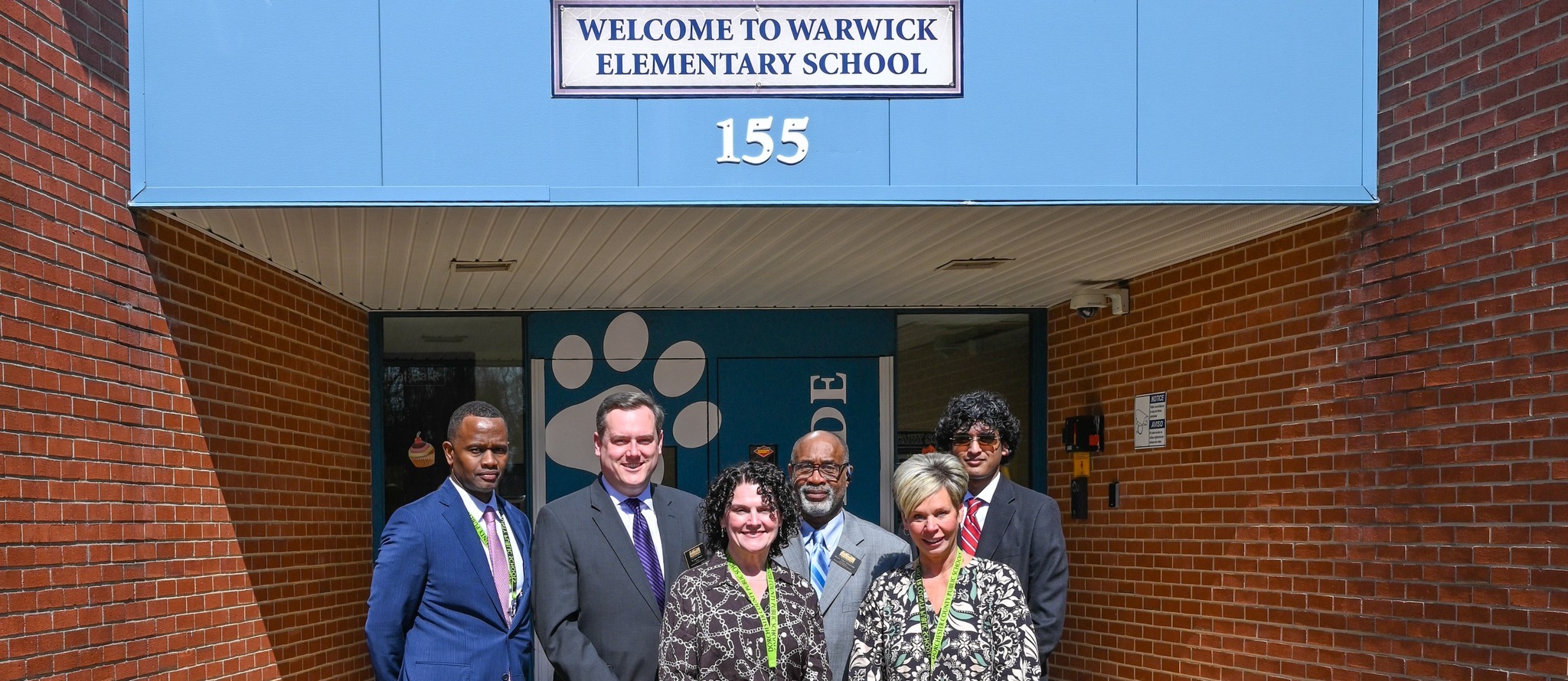 administrators standing in front of WES