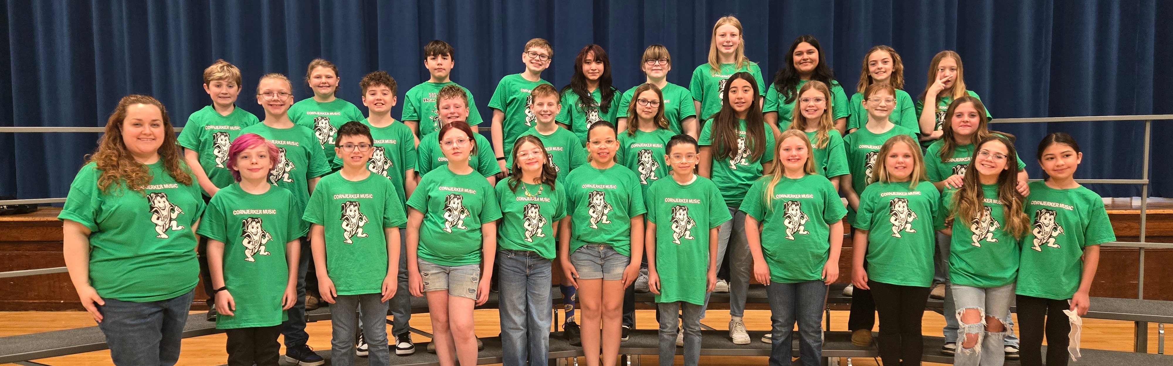 JG Chorus in their new green music t shirts.