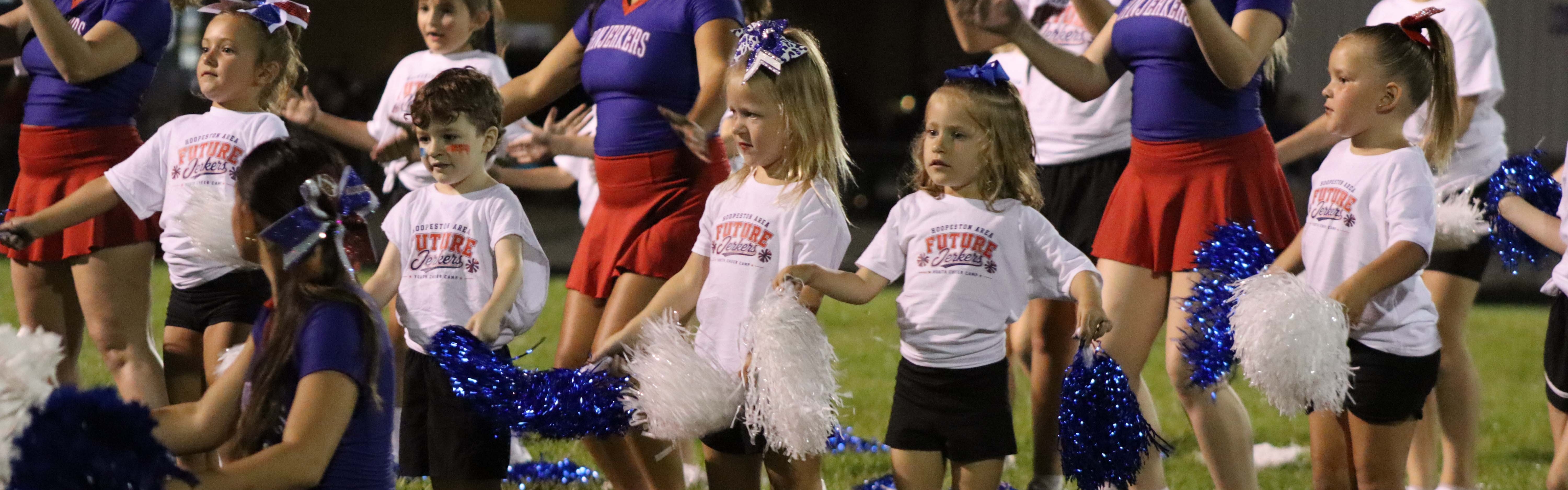 Cheering with the little ones at the first home game.