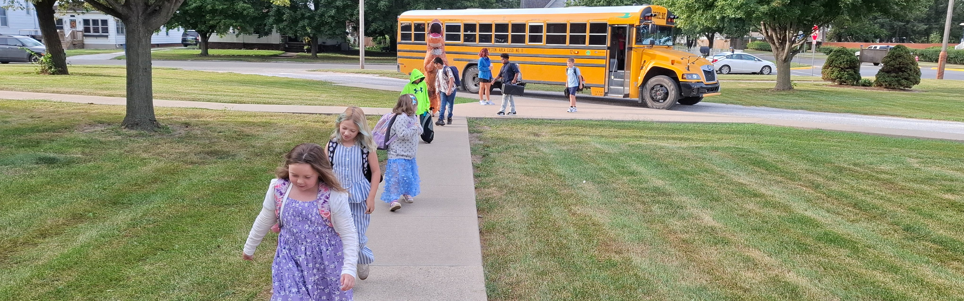 Getting off the bus at John Greer!
