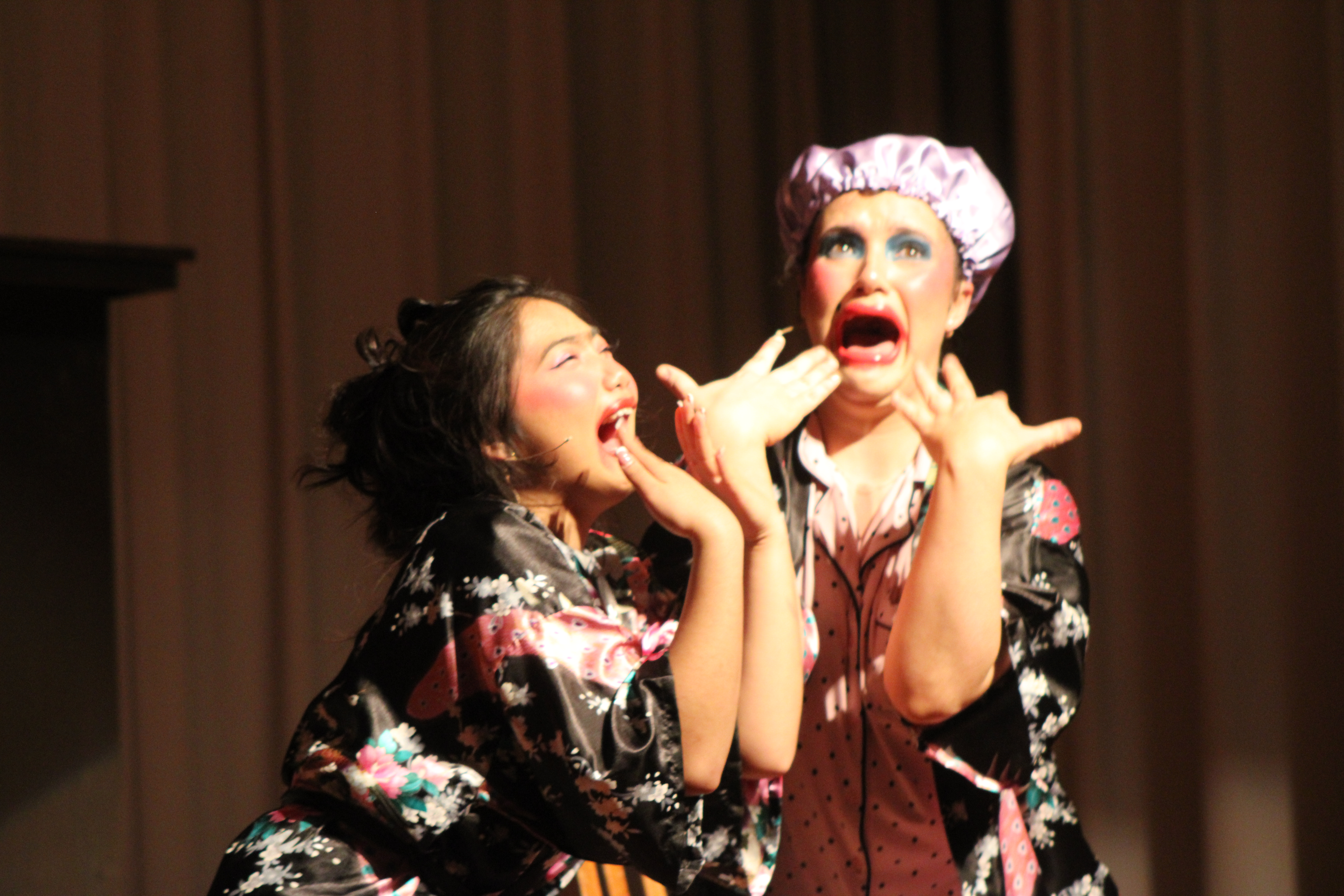 Making faces during a middle scene act.
