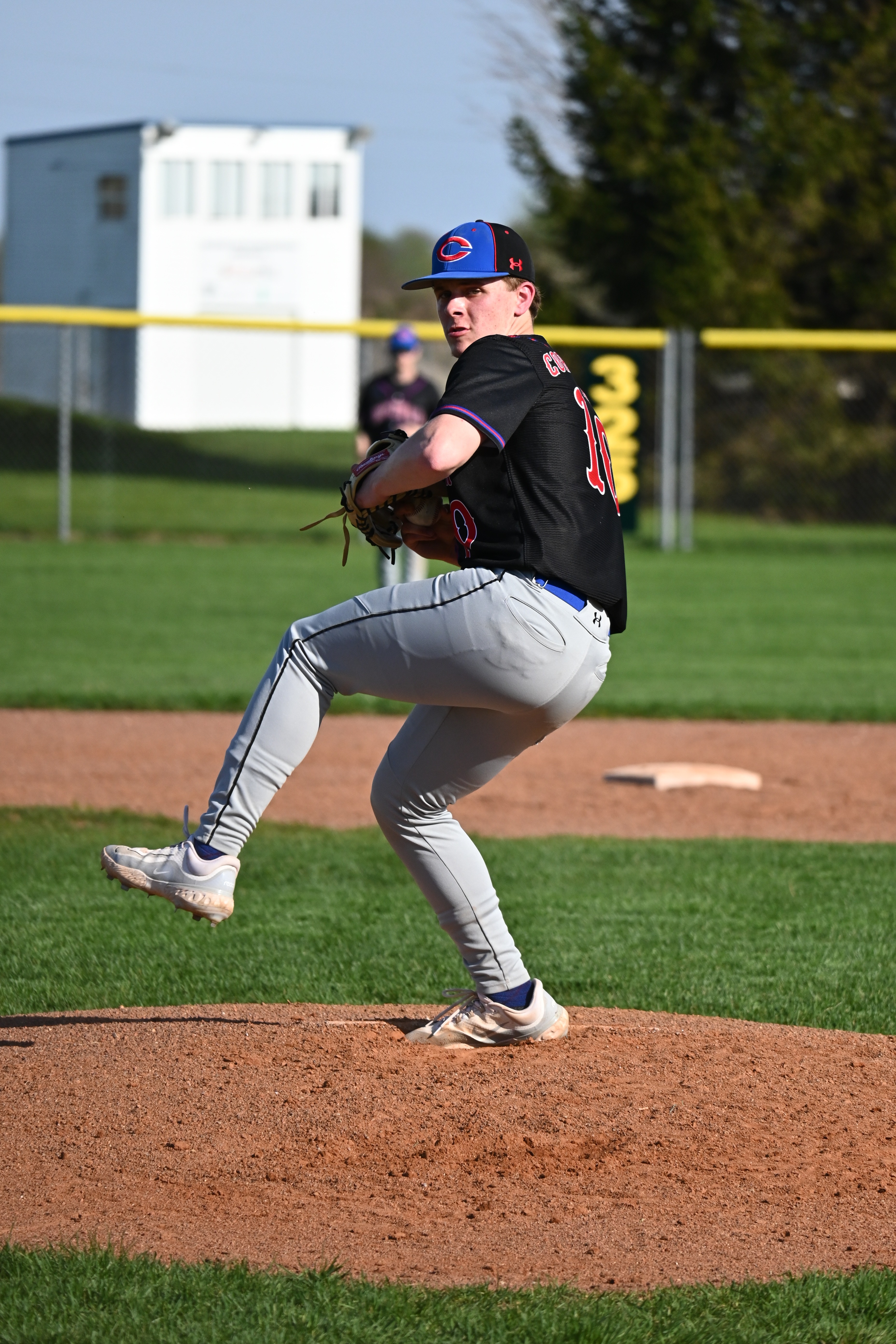 Zach geating ready to pitch against Milford.