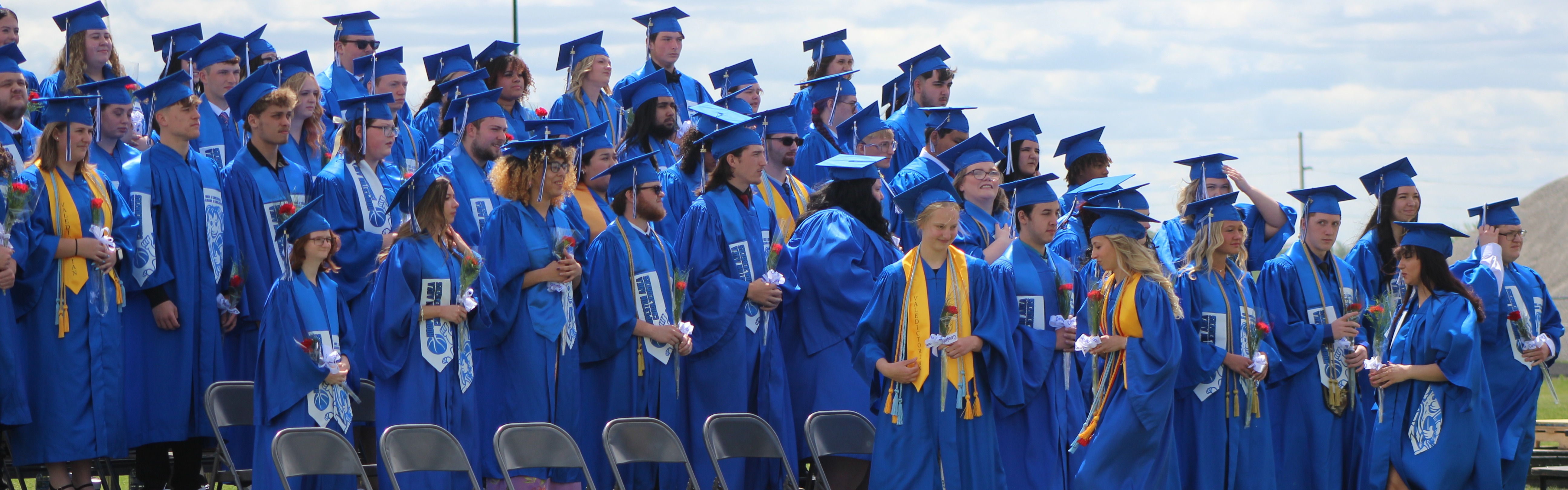Graduation 2025 walking to their seats.