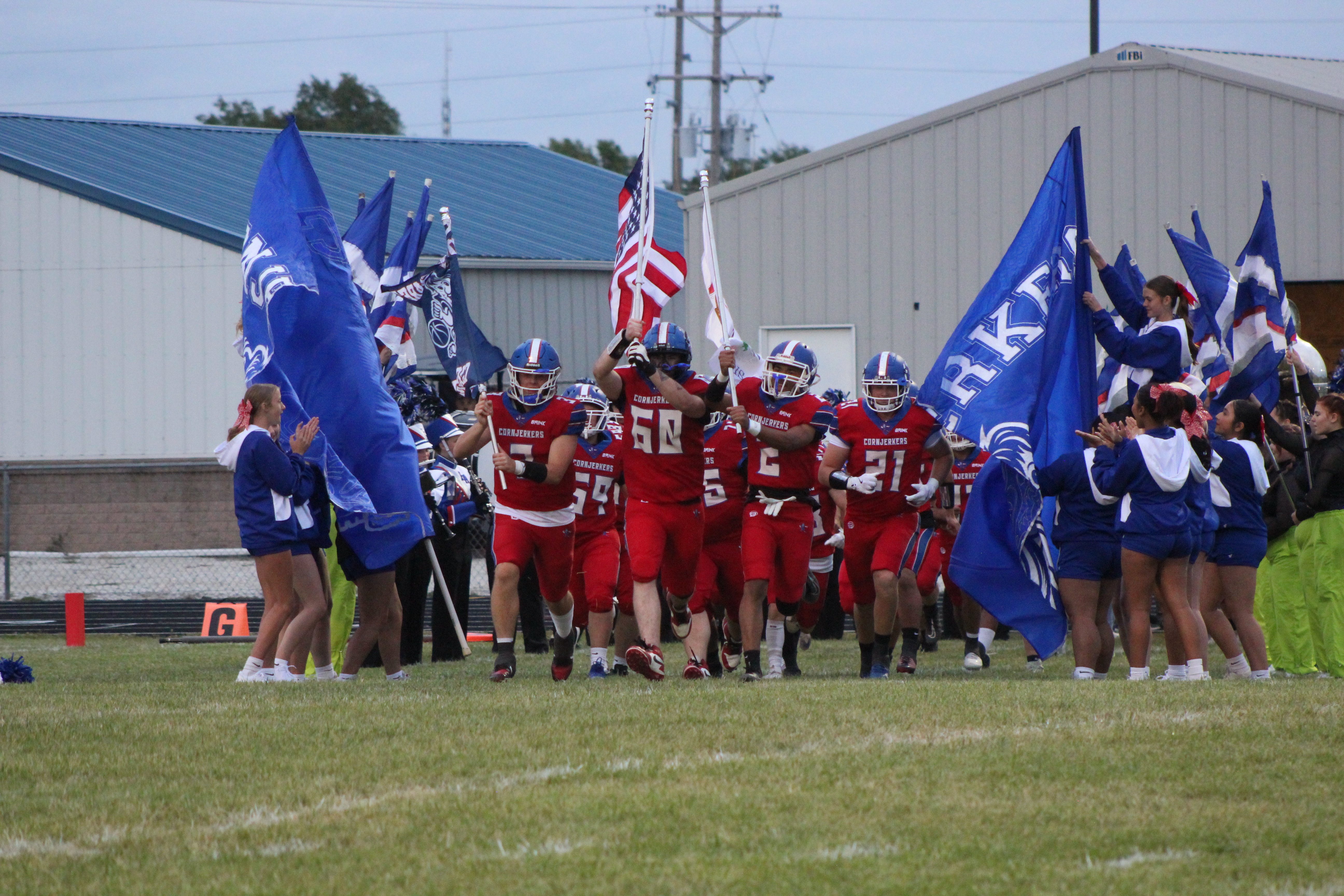 Running onto the field for the 1st home game.