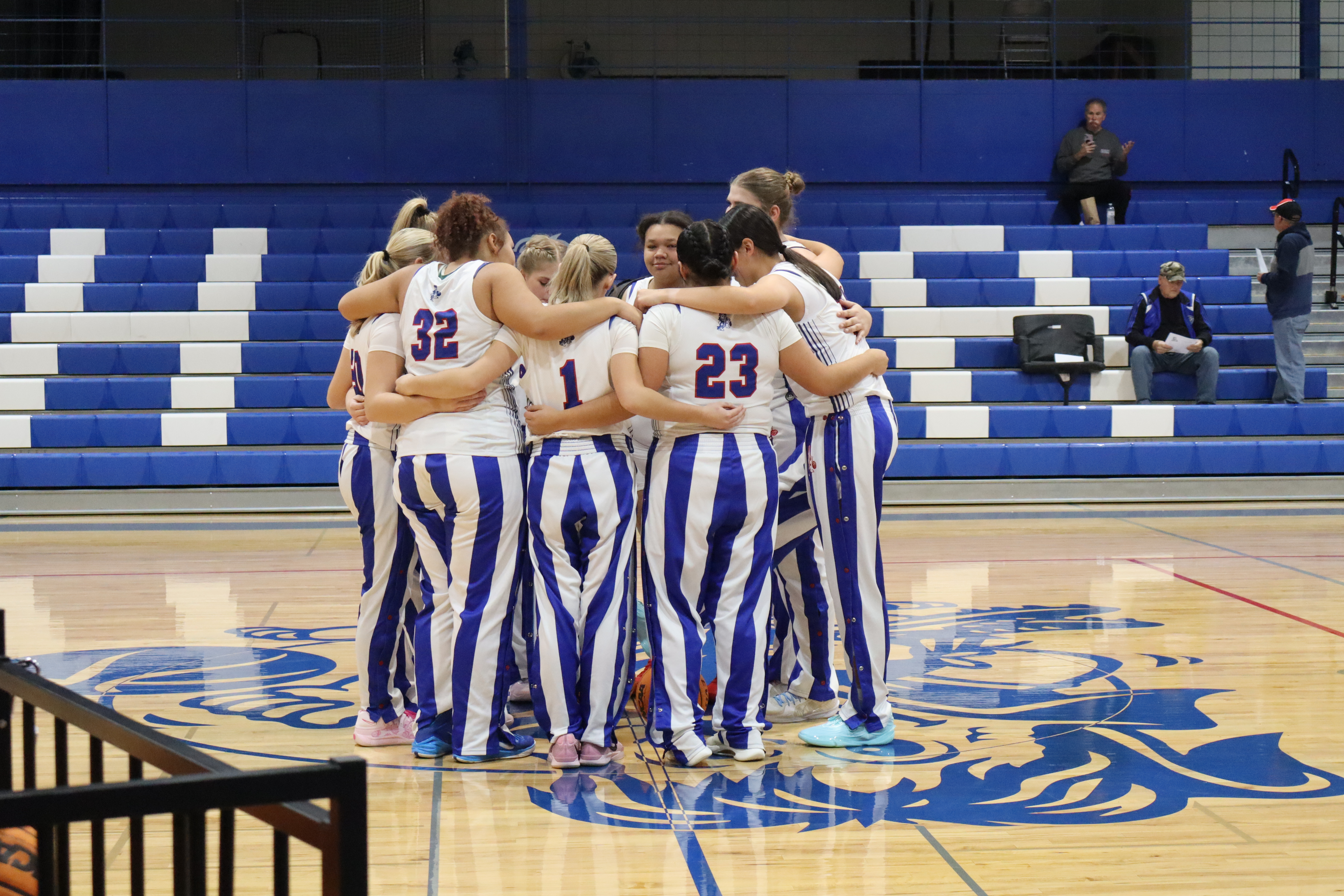 Teammates in the huddle.