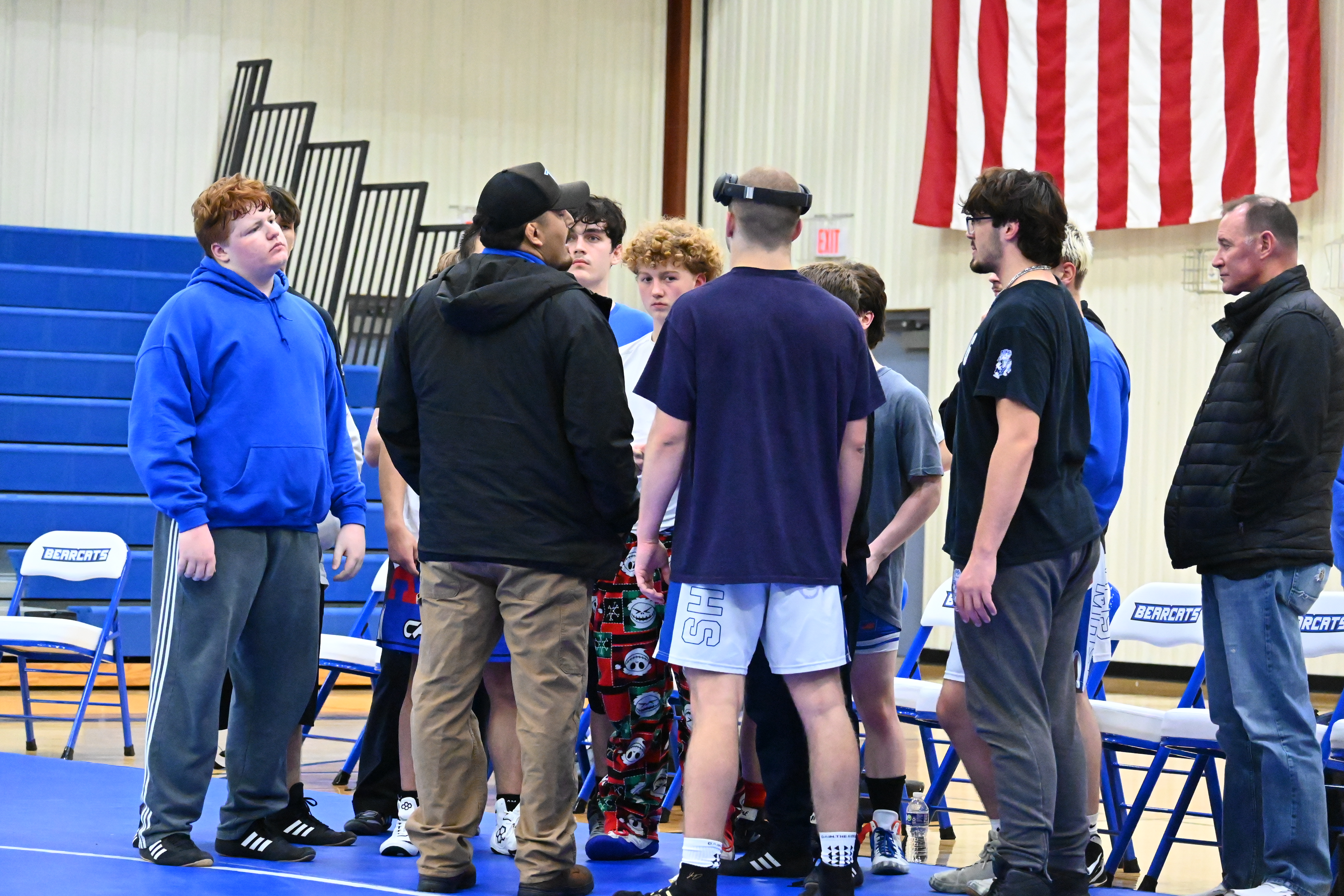 Milford match huddle before the match.