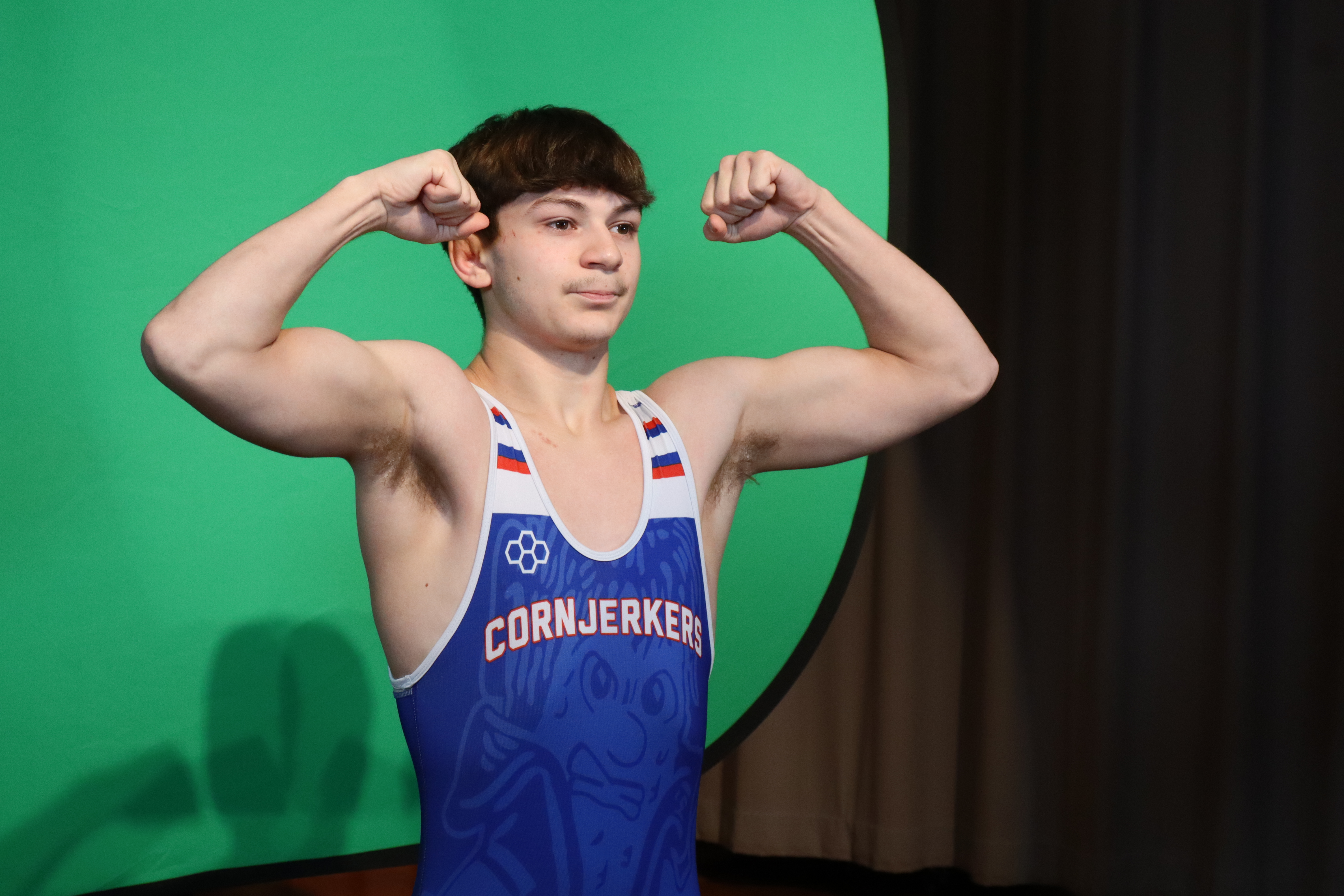 Charlie showing off his muscles.