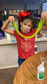 Launch student playing with homemade slime