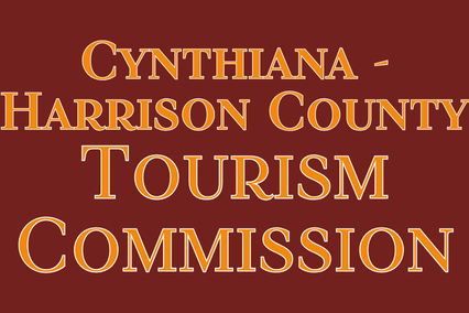 A maroon background displays white text: "Cynthiana-Harrison County Tourism Commission". The text is centered.