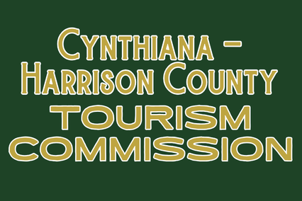 A green backdrop displays the words "Cynthiana – Harrison County Tourism Commission" in white and gold text.